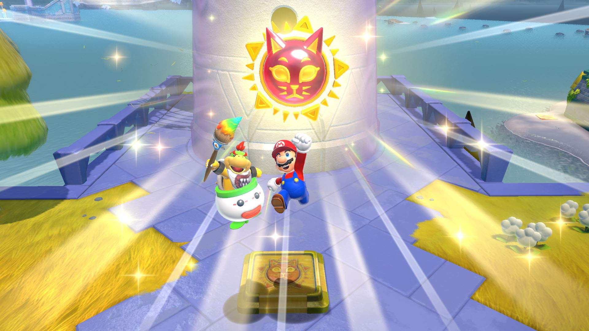 Mario y Bowser Jr. con un emblema de sol-gato. Mario salta con el puño en alto. Luces brillantes, agua y hierba en el fondo.