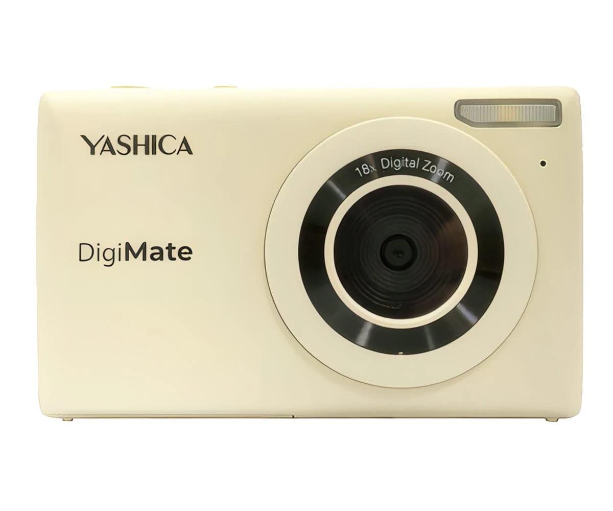 Cámara digital Yashica DigiMate color crema. Cuenta con lente, flash y nombre de la marca. Tiene zoom digital 18x.