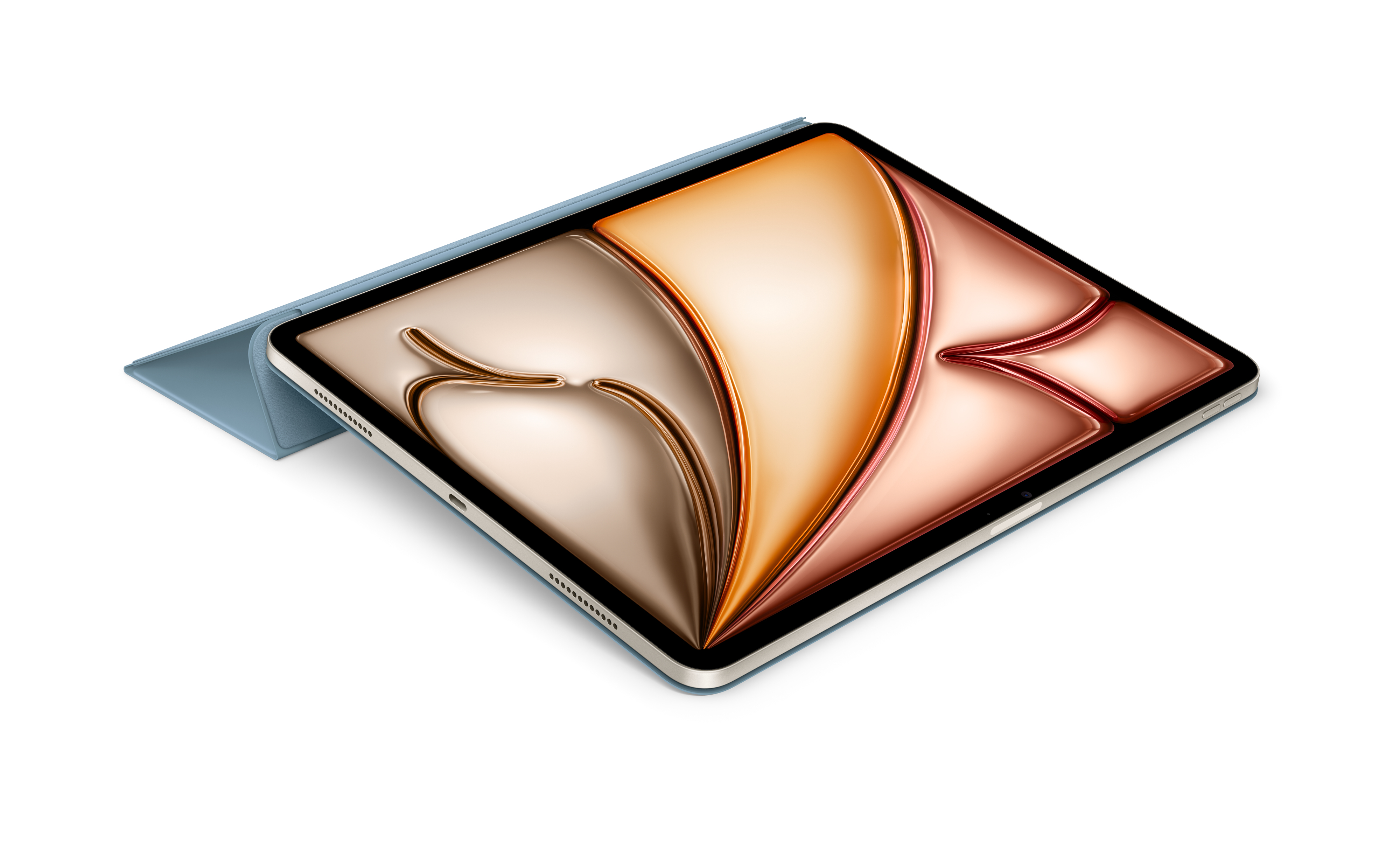 Tablet z niebieskim etui, ekran wyświetla wzór w różnych kolorach. Tło jest białe.