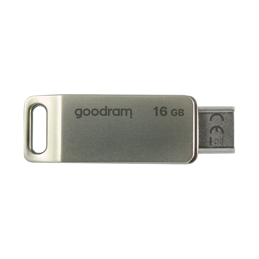 Srebrny pendrive Goodram 16GB na białym tle. Ma prostokątny kształt z pętlą na jednym końcu.