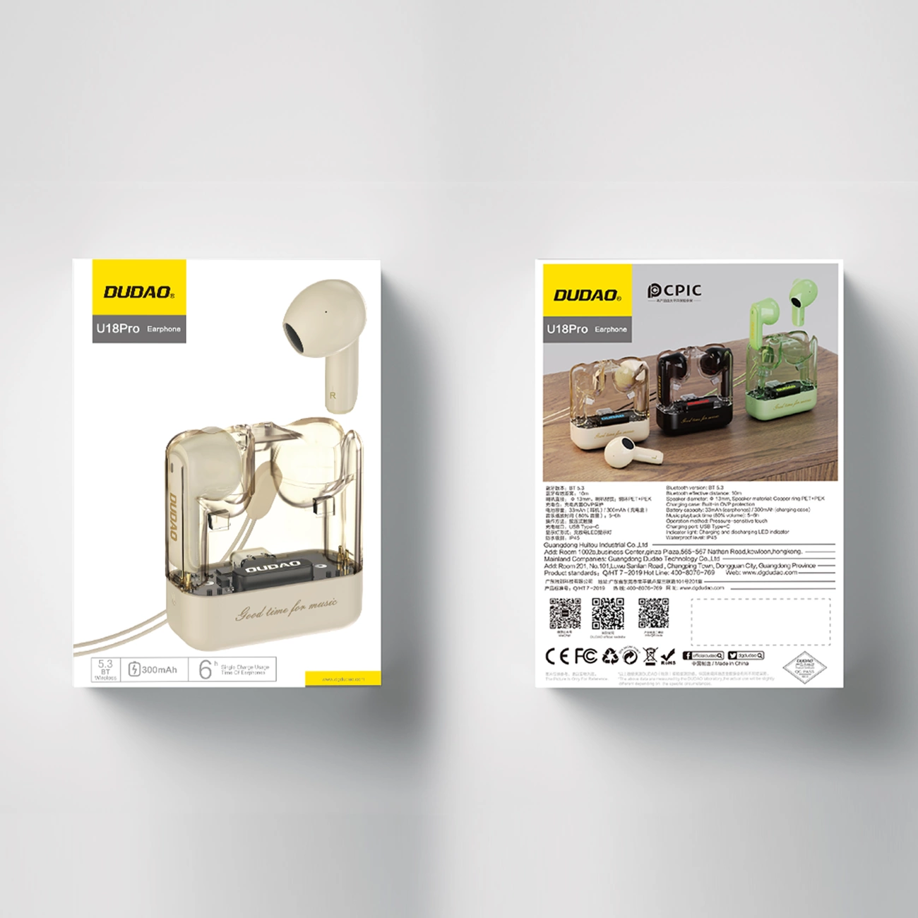 Słuchawki na pudełku. Pudełko zawiera szczegóły produktu. Obok znajdują się inne słuchawki.