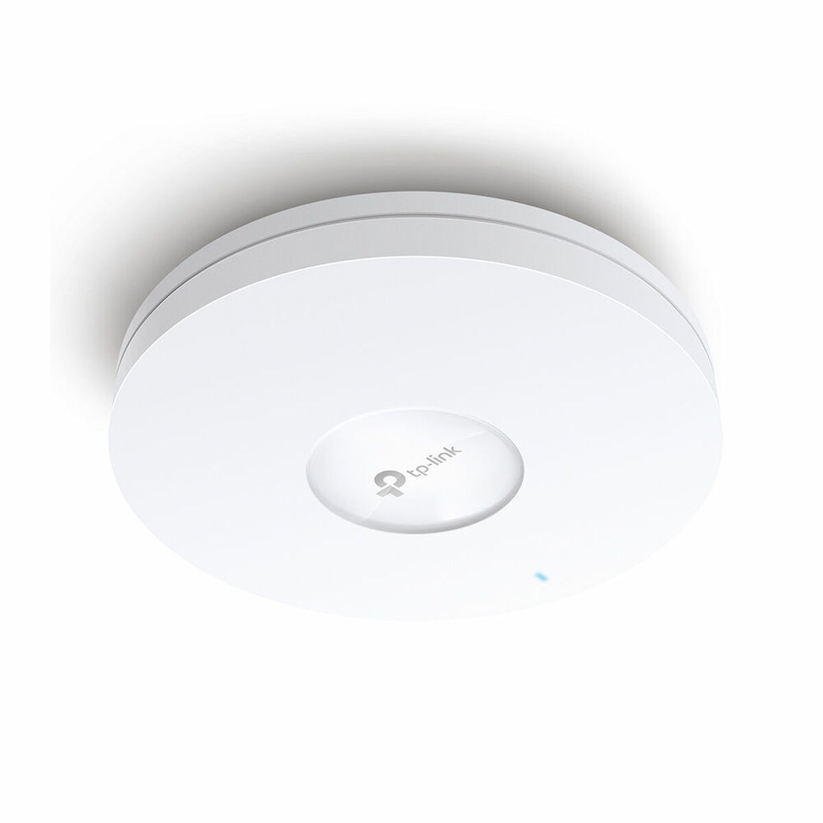 Ein weißer TP-Link-Access-Point ist auf einer weißen Oberfläche montiert. Er hat eine runde Form mit sichtbarem Logo. Eine blaue LED leuchtet.