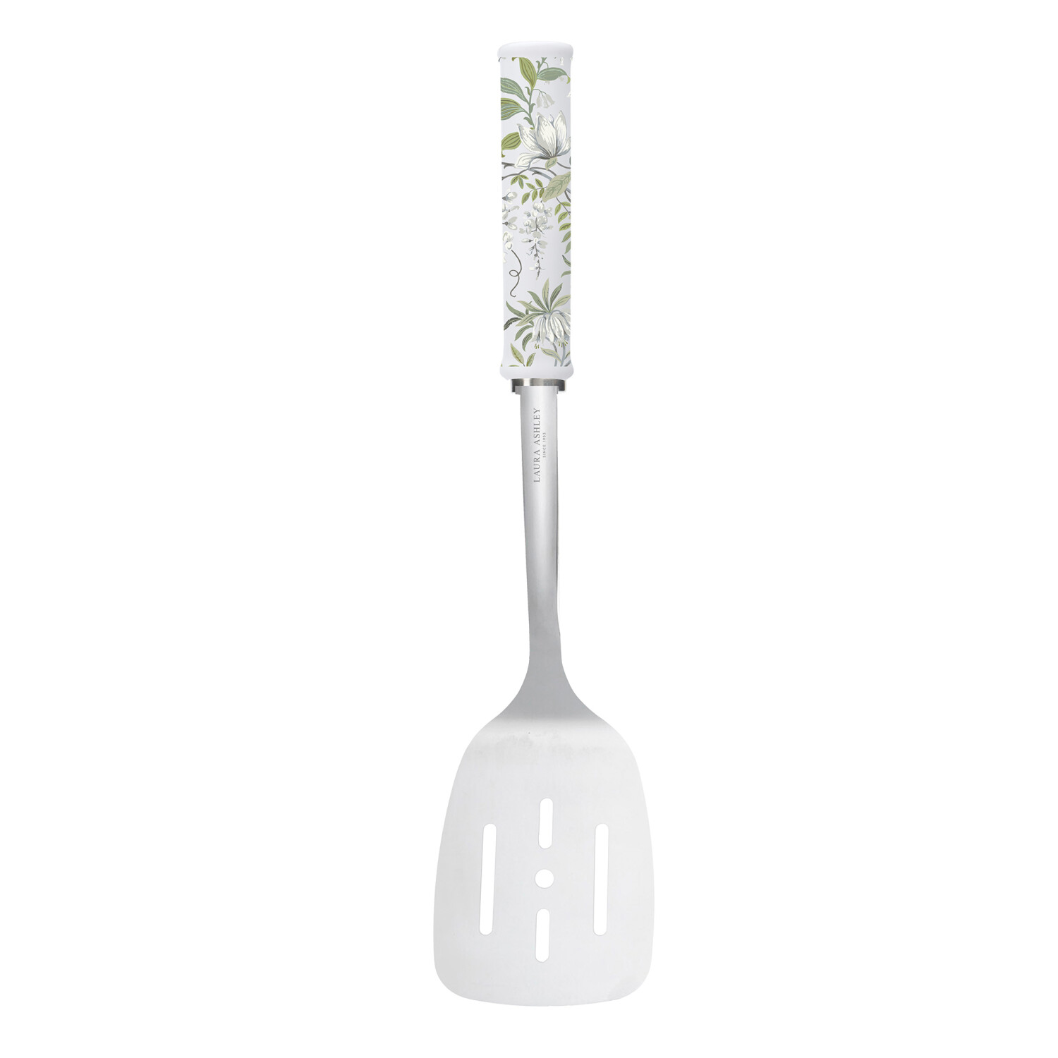 Ein Pfannenwender mit weißem Kopf mit Schlitzen. Der Griff hat ein florales Design mit grünen Blättern und weißen Blumen.