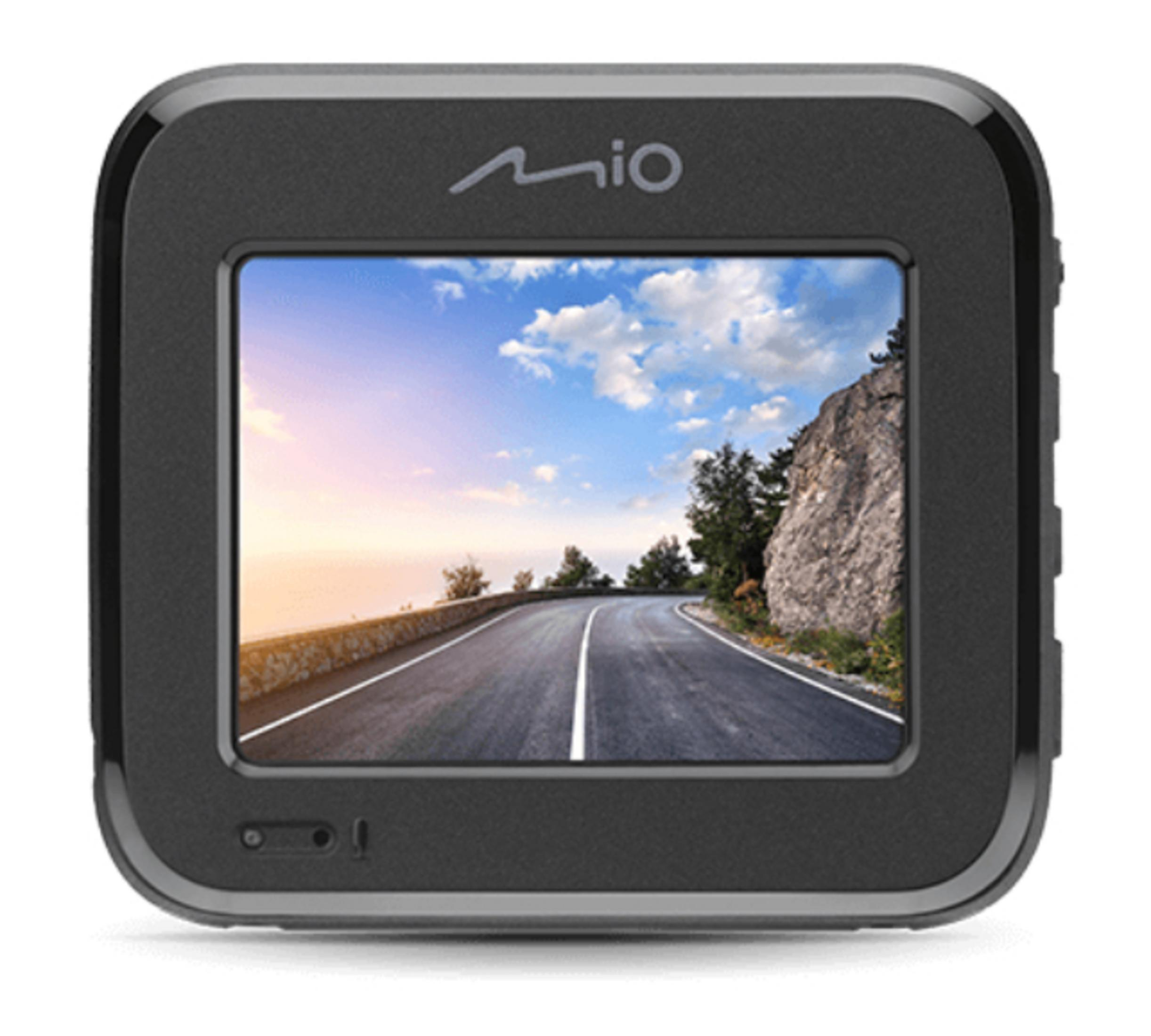 A dashcam shows a road winding through a landscape with a blue sky and clouds. A rocky cliff on the right.