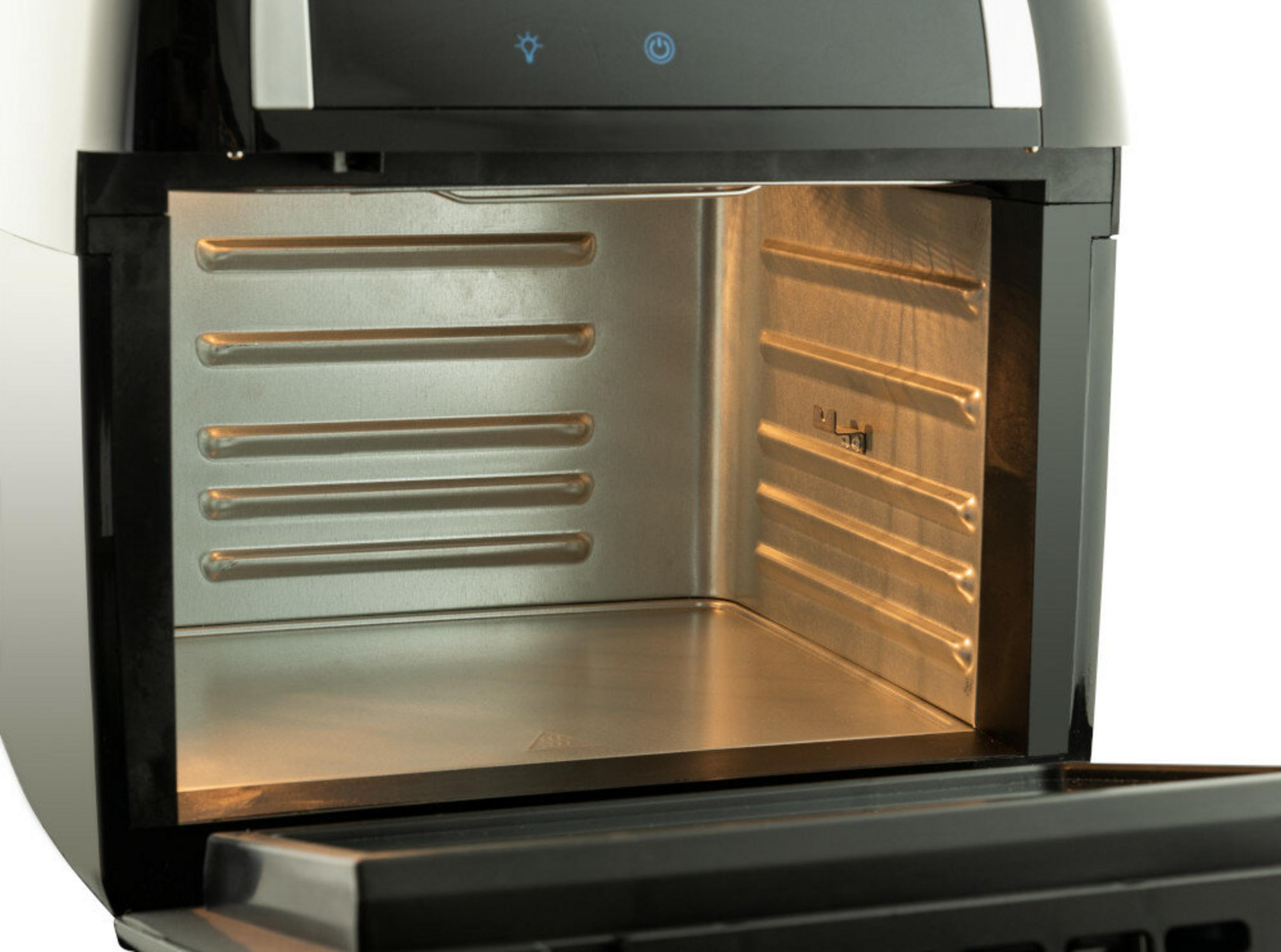 Offener Airfryer-Innenraum. Die Innenseite ist Edelstahl. Oben befinden sich Licht- und Stromsymbole.