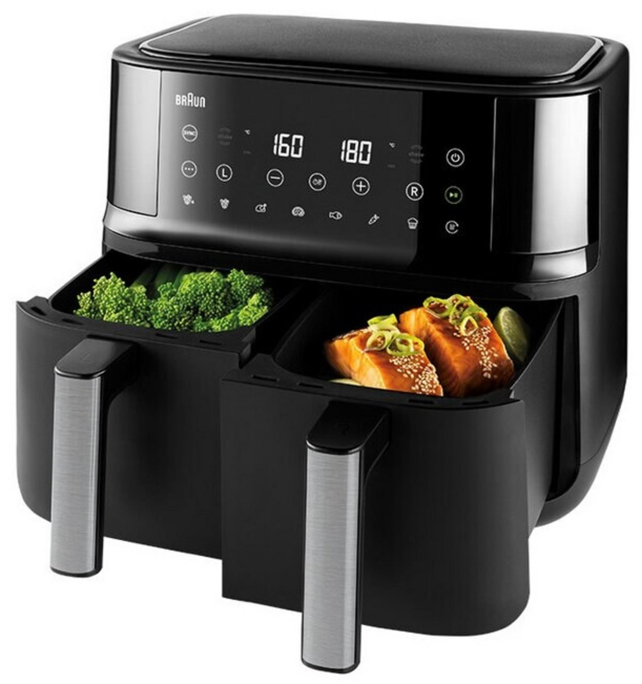Zwarte Braun airfryer met twee compartimenten. Eén heeft broccoli, de andere zalm. Digitaal display toont 160 en 180.