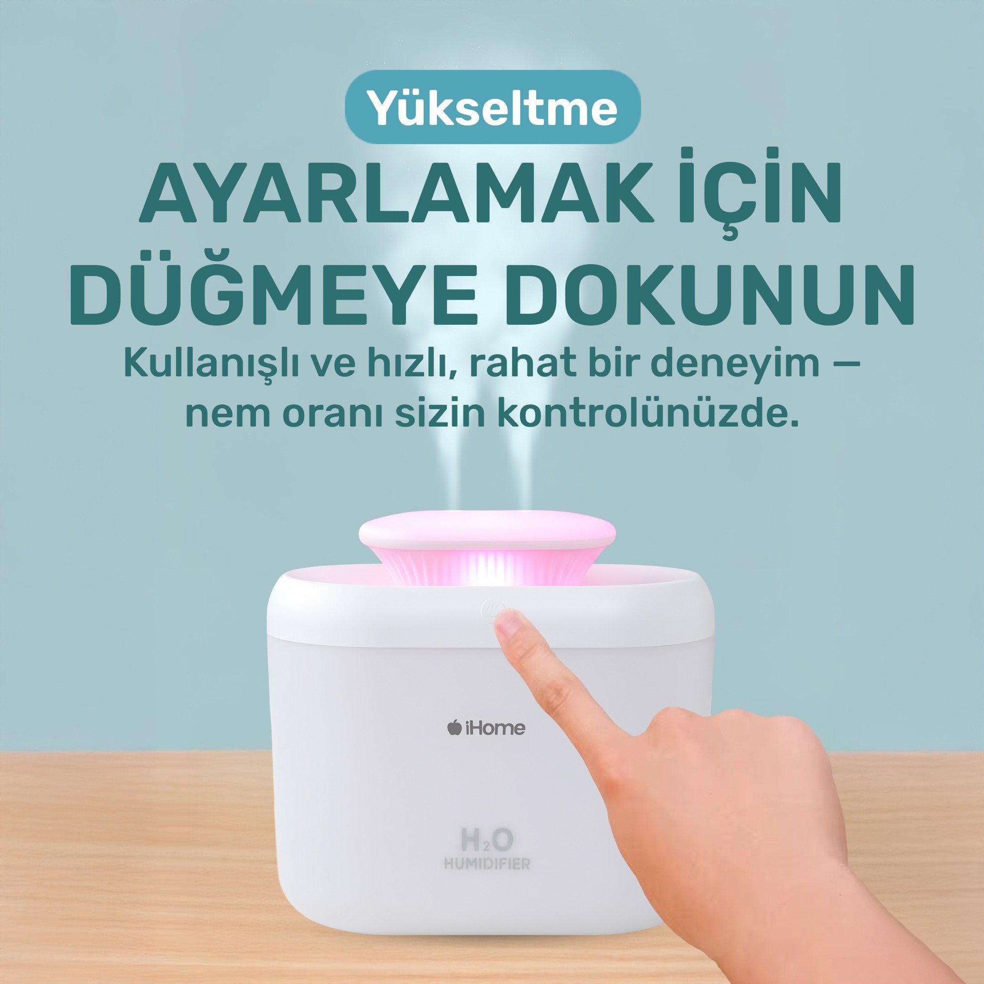 Pembe üstü olan beyaz bir nemlendirici. Bir el bir düğmeye dokunuyor. Üstte Türkçe metin var.