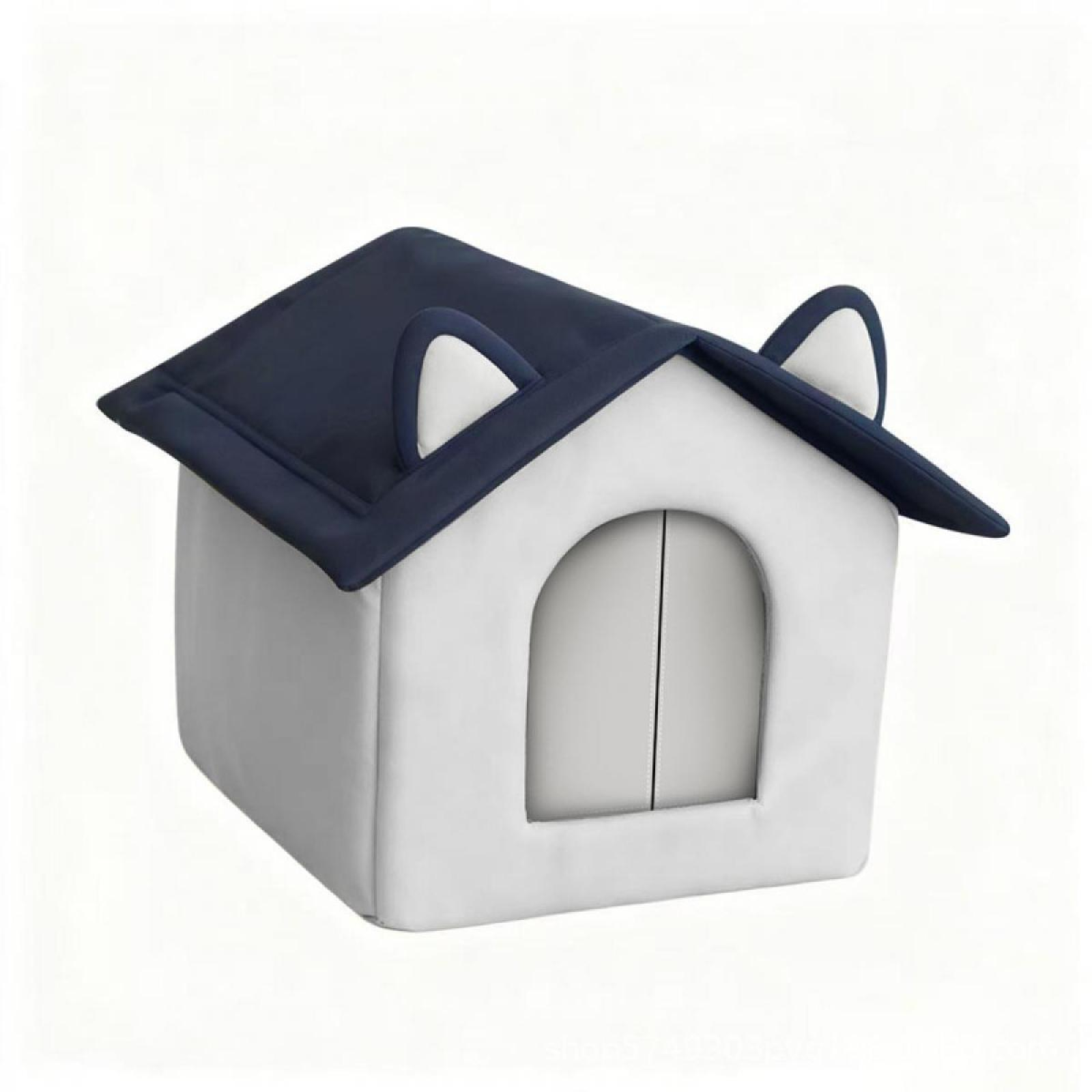 Ein weißes und marineblaues Tierhaus in Form eines Hauses. Es hat ein marineblaues Dach und ohrförmige Details.