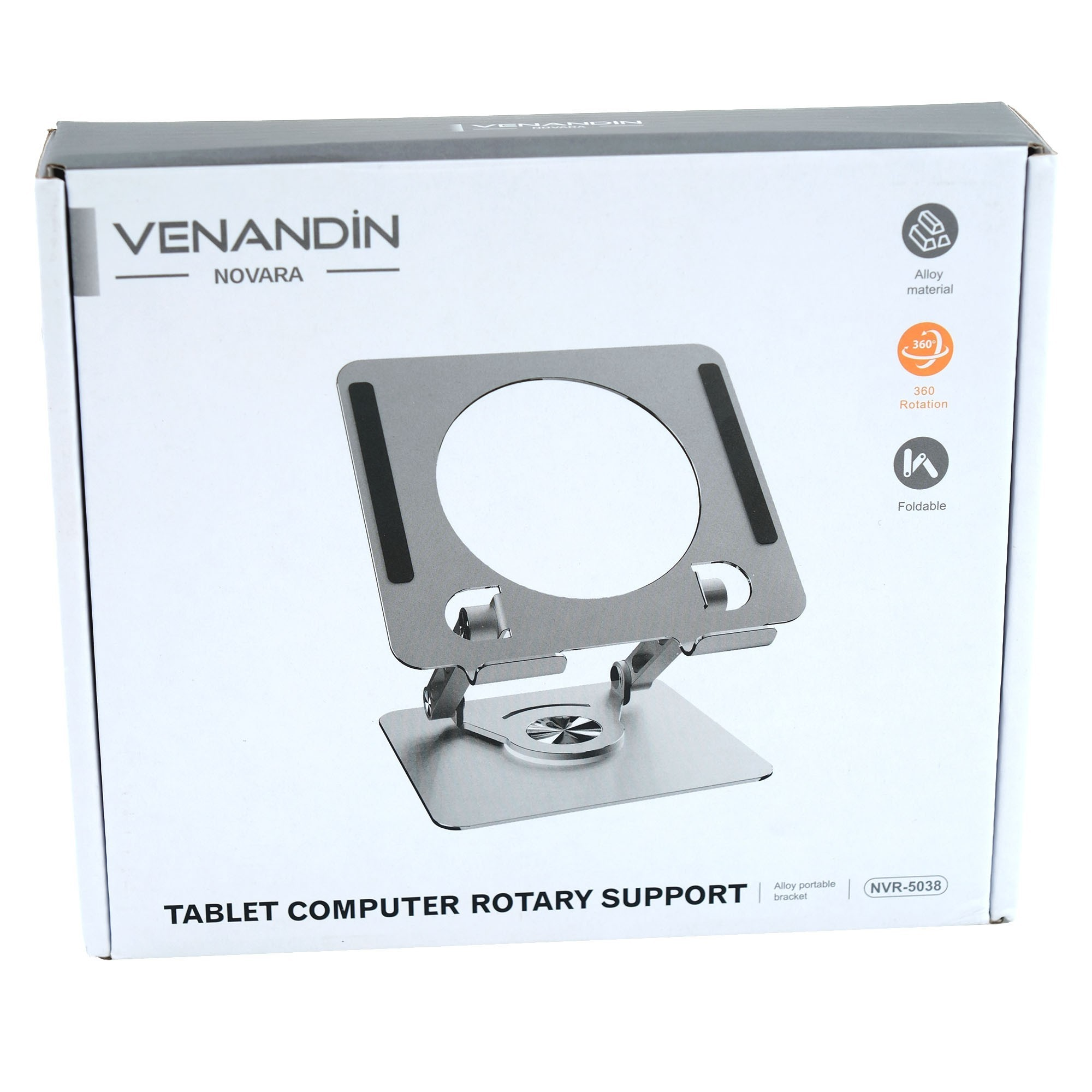 Bir kutuda bir tablet standı. Gümüş renkli, dairesel bir tutucuya sahip. Kutuda metin: VENANDIN, TABLET COMPUTER ROTARY SUPPORT.