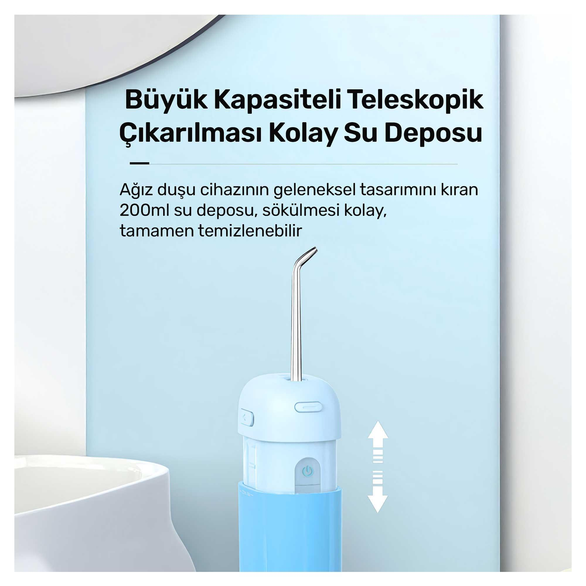 Mavi ve beyaz ağız duşu. Türkçe metin, büyük kapasiteli ve çıkarılabilir su tankına sahip olarak tanımlar.