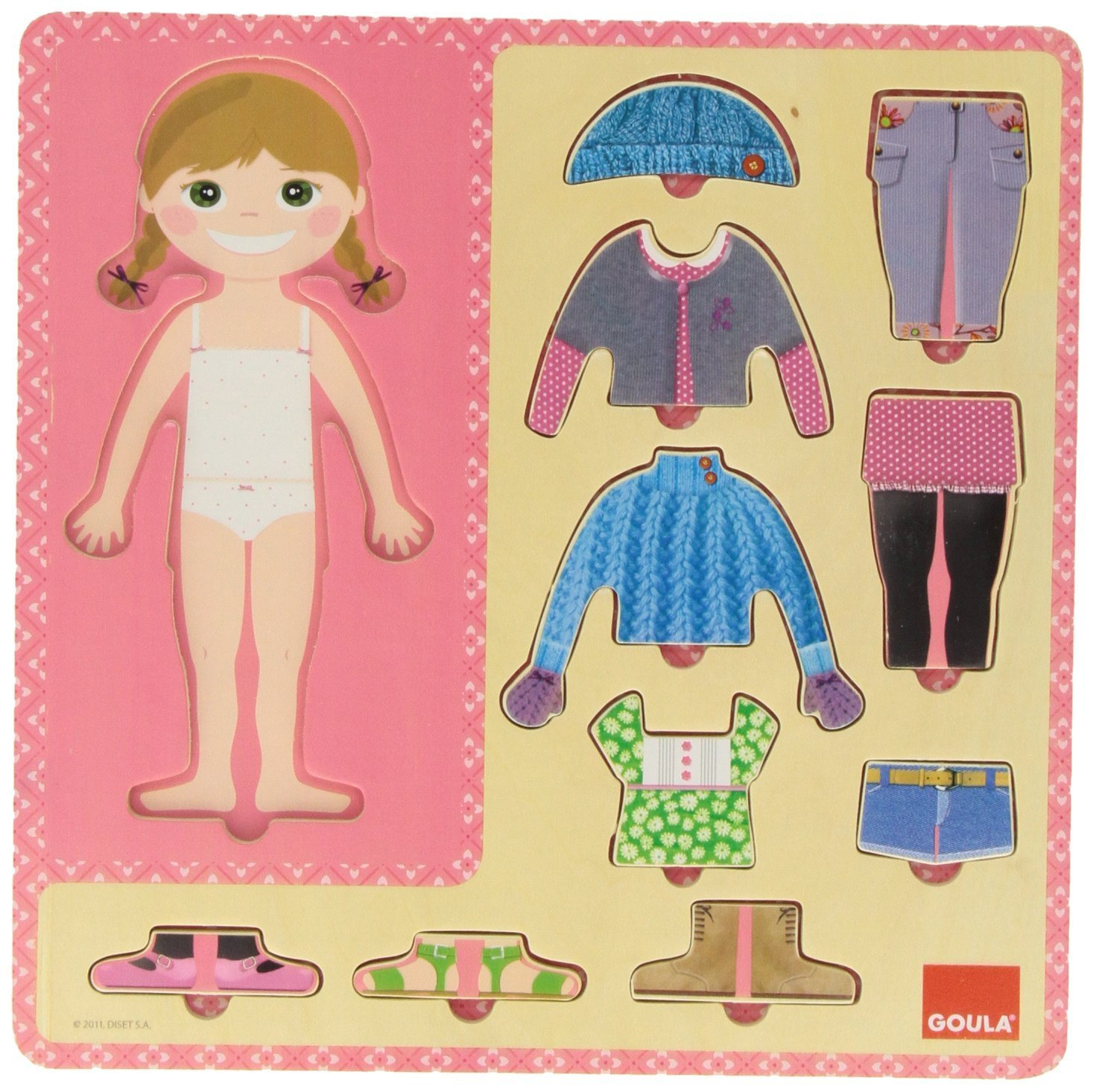 Un rompecabezas de madera con una figura de niña y varias prendas de vestir: sombreros, suéteres, pantalones, faldas y zapatos. Colores: rosa, azul y verde.