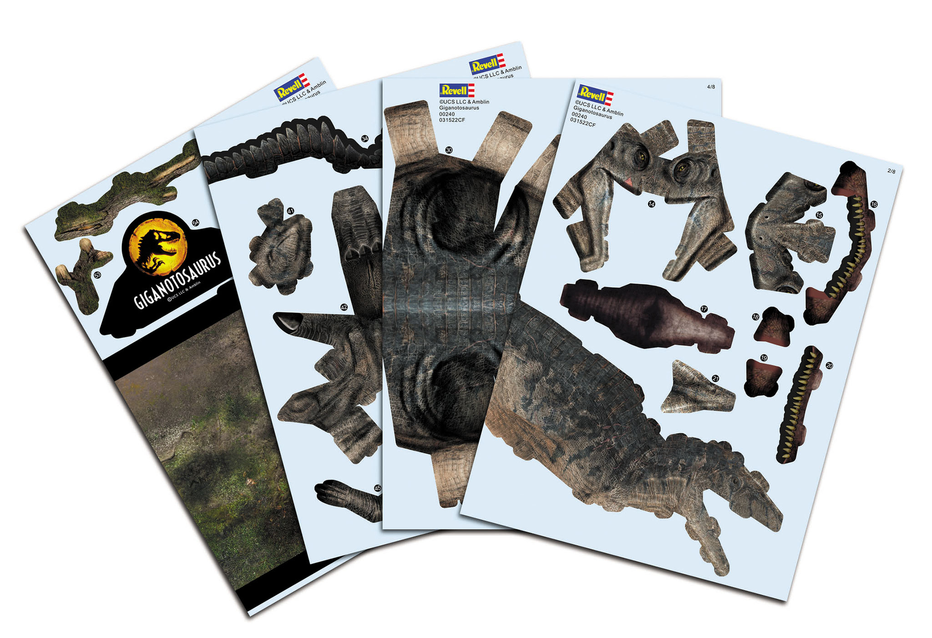 Verschillende vellen met dinosauruspuzzelstukjes. Vellen hebben Revell- en Jurassic World-logo's. Onderdelen van de Giganotosaurus zijn zichtbaar.
