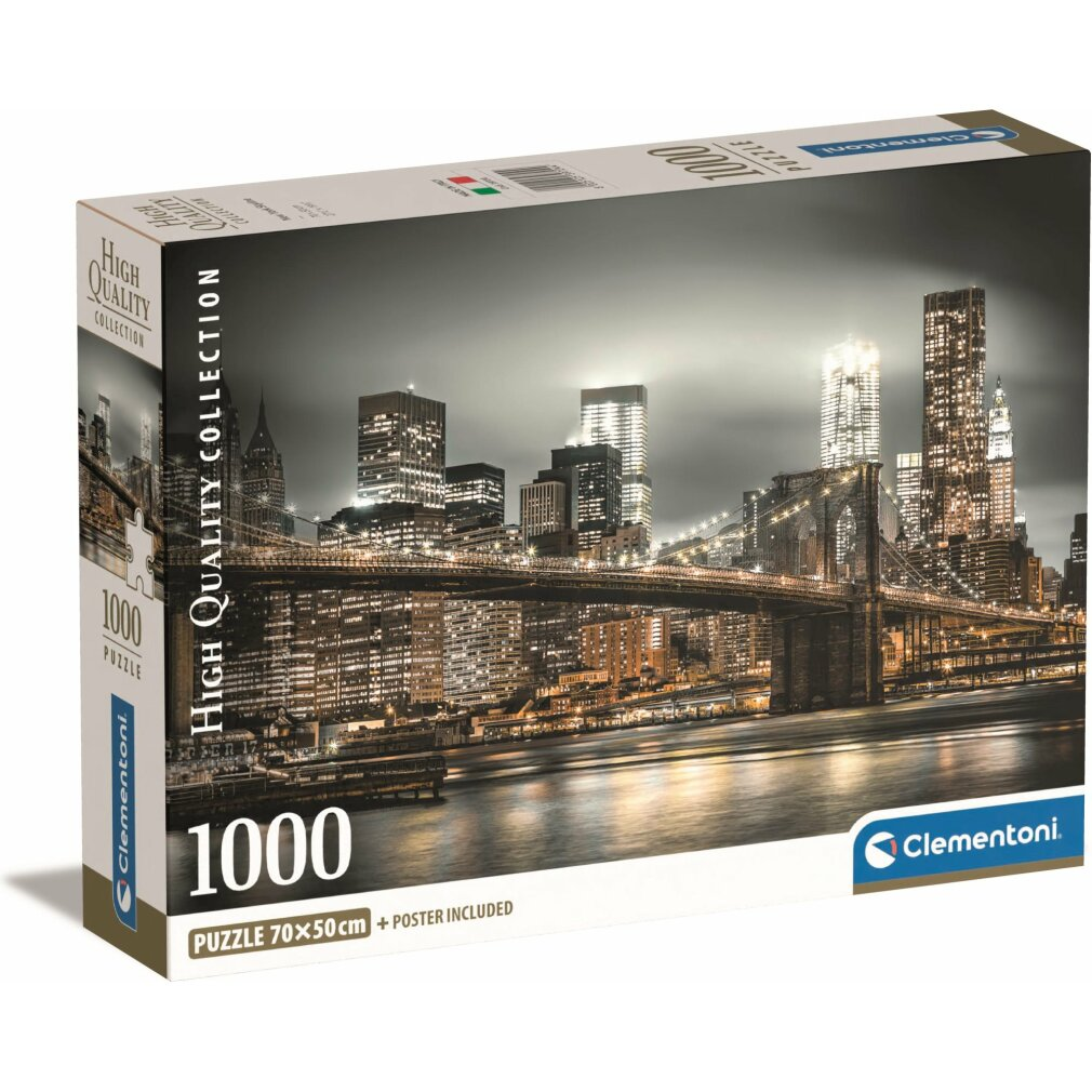 Boîte de puzzle avec le skyline de New York la nuit avec le pont de Brooklyn. Bâtiments avec lumières, reflets d'eau et logo Clementoni.