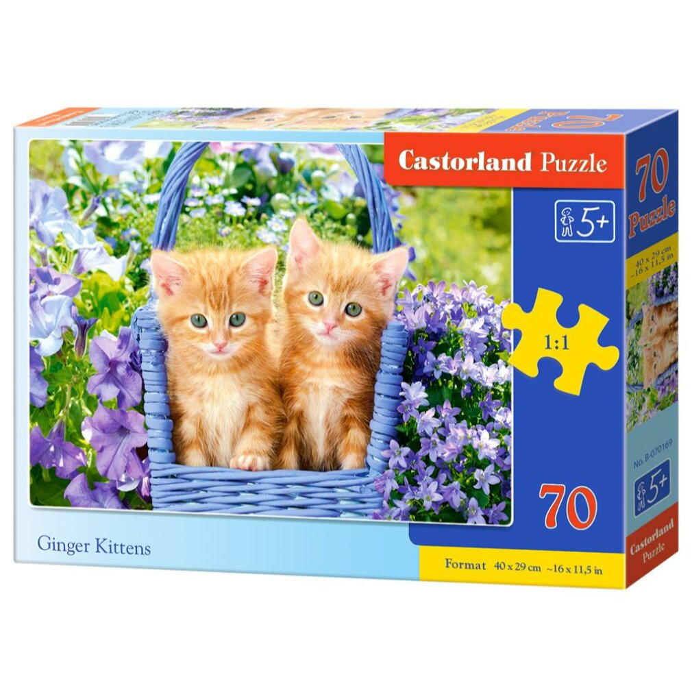 Eine Puzzledose zeigt zwei gingerfarbene Kätzchen in einem blauen Korb, umgeben von lila Blumen. Das Puzzle hat 70 Teile.