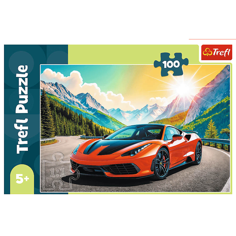 Puzzle d'une voiture de sport orange sur une route de montagne avec des montagnes et le soleil en arrière-plan. Le puzzle est de la marque Trefl.