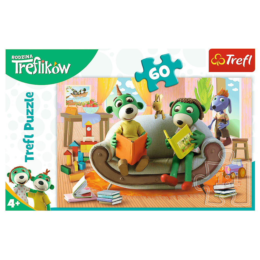 Een Trefl-puzzel toont stripfiguren die op een bank lezen. Een puzzelstukje zweeft boven hen.