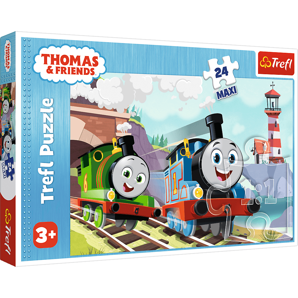 Pudełko z puzzlami Trefl Thomas & Friends. Pokazuje Percy'ego i Thomasa the Tank Engine na torach z latarnią morską w tle.