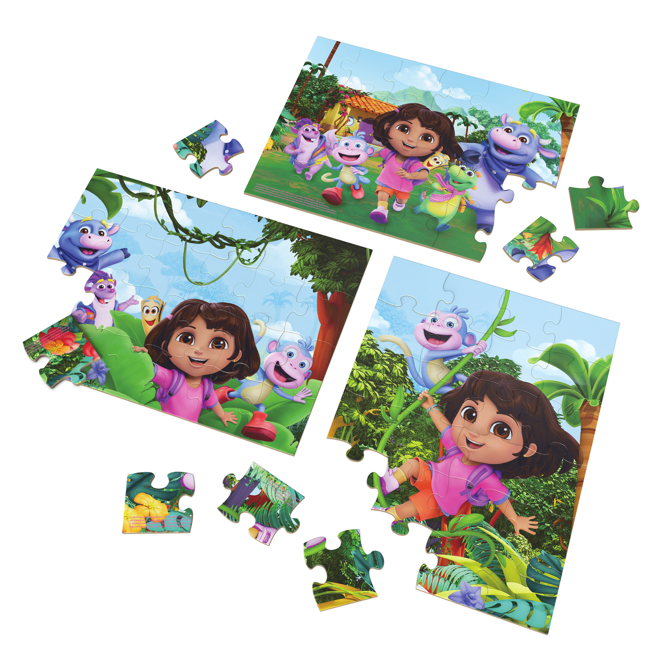 Tre puzzle di Dora l'Esploratrice con pezzi mancanti, che mostrano Dora e i suoi amici in un ambiente giungla.
