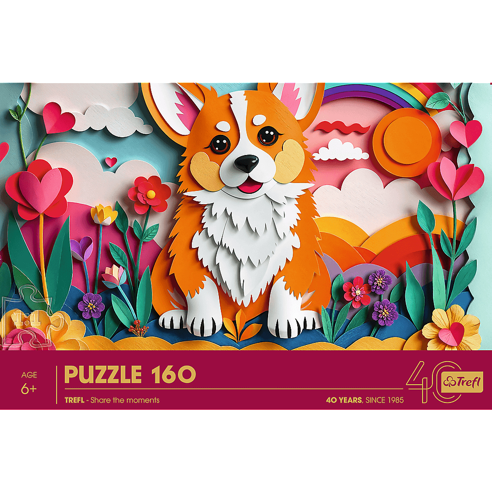 Pudełko z puzzlami w stylu wycinanki z papieru. Przedstawia psa corgi w kolorowym ogrodzie z tęczą i kwiatami.