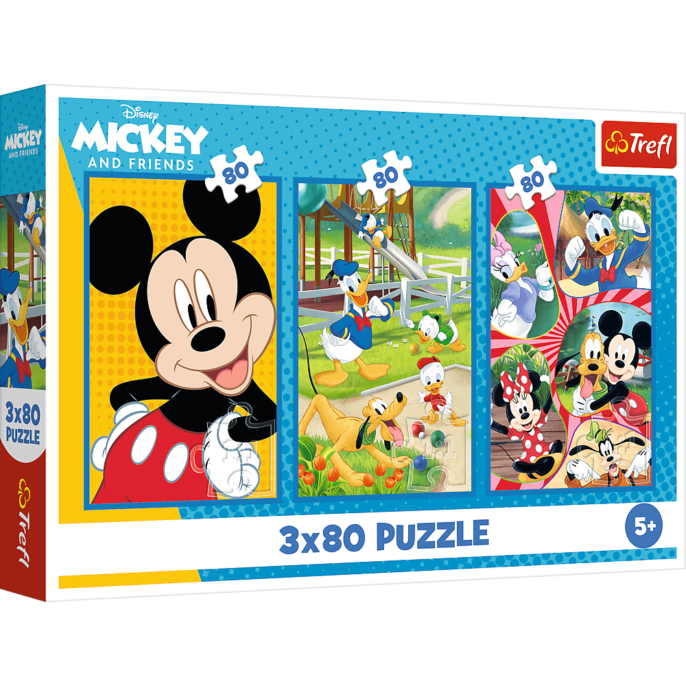 Une boîte de puzzle Mickey et ses amis. Mickey Mouse est présenté avec d'autres personnages comme Donald Duck et Pluto, avec une scène de terrain de jeu.