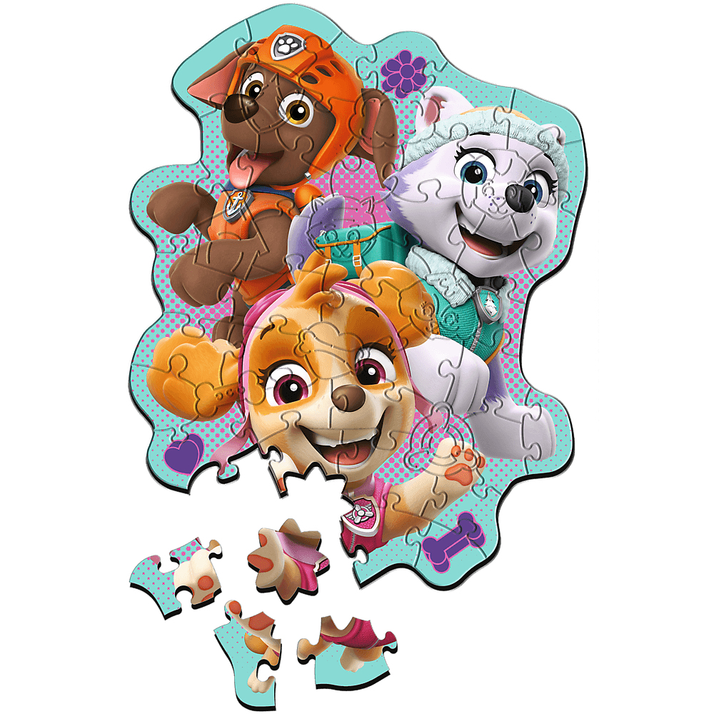 Ein Paw Patrol-Puzzle mit drei Zeichentrickhunden: Skye, Everest und Marshall. Einige Puzzleteile sind abgelöst und unter dem Hauptteil verstreut.