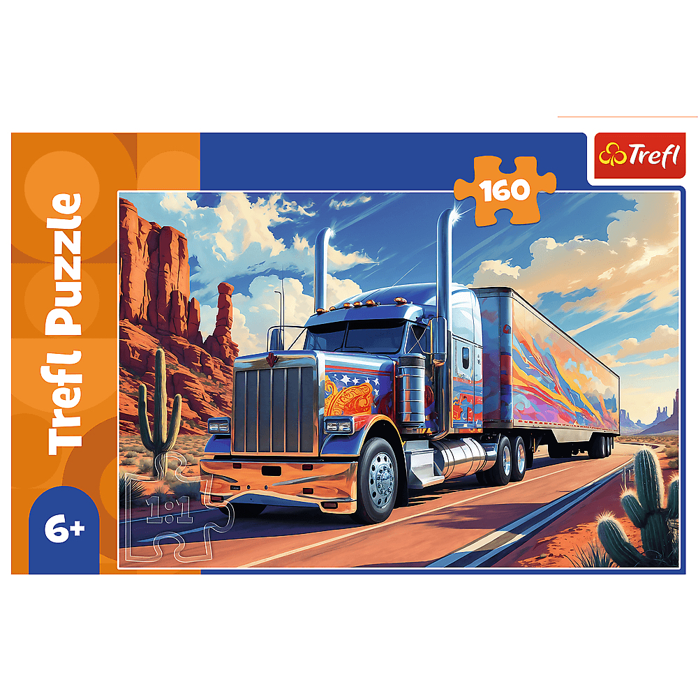 Puzzle eines Sattelschleppers auf einer Wüstenstraße, Berge und Kakteen im Hintergrund, blauer Himmel mit Wolken.