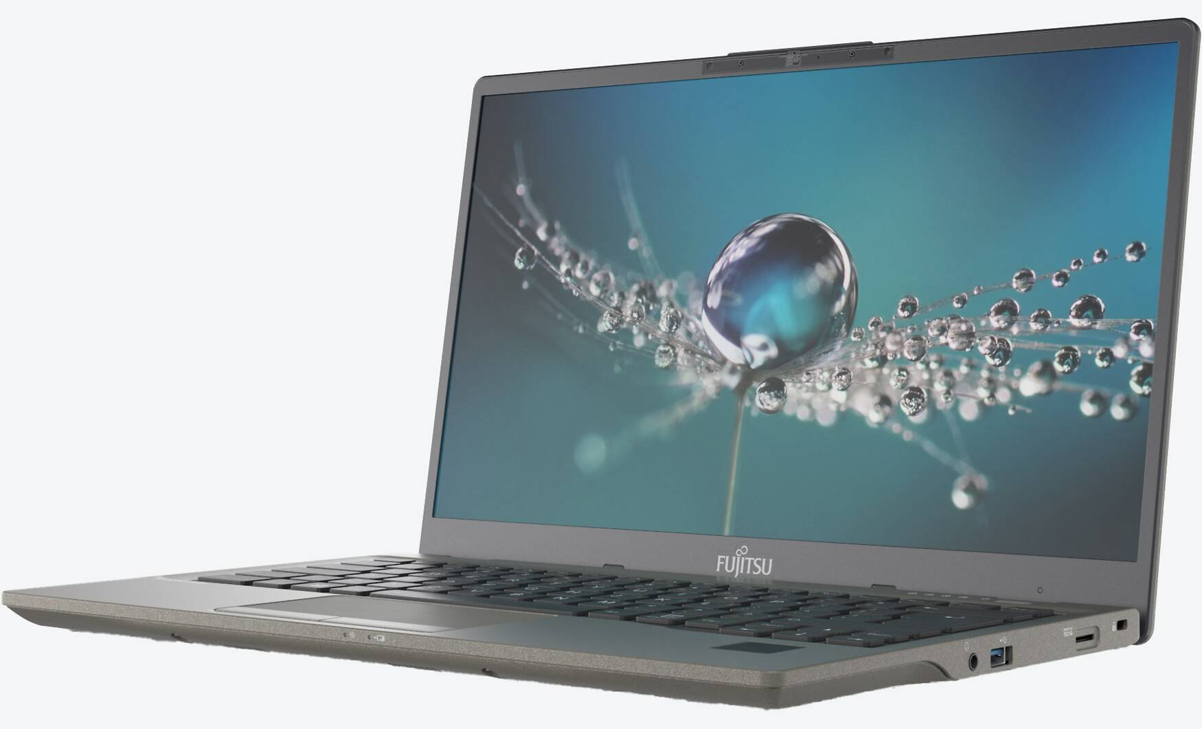 Ein grauer Fujitsu-Laptop ist geöffnet und zeigt eine Nahaufnahme von Wassertropfen auf einer Pflanze vor teal Hintergrund.