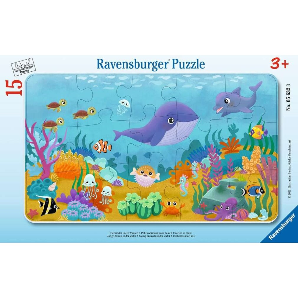 Un puzzle Ravensburger raffigura una scena subacquea con creature marine come balene, delfini, pesci, tartarughe e polpi.