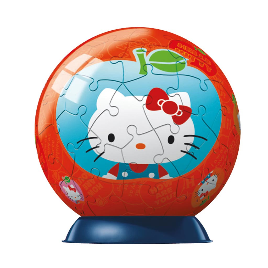 Ein kugelförmiges Puzzle mit Hello Kitty. Das Puzzle ist orange mit einem Apfeldesign. Kittys Gesicht ist in der Mitte mit einer roten Schleife.