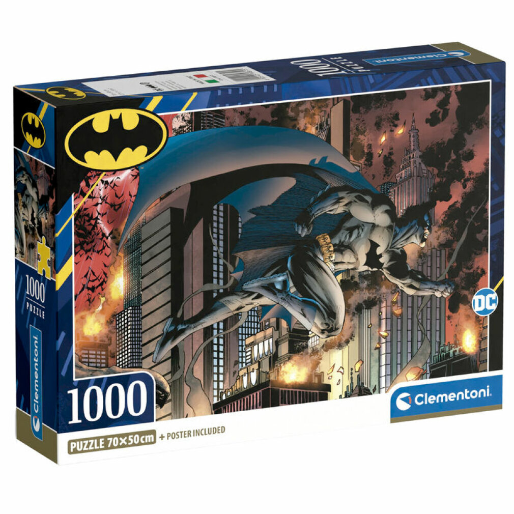 Scatola puzzle di Batman. Batman in volo, sfondo della città con esplosioni. La scatola ha il logo di Batman e il logo Clementoni.