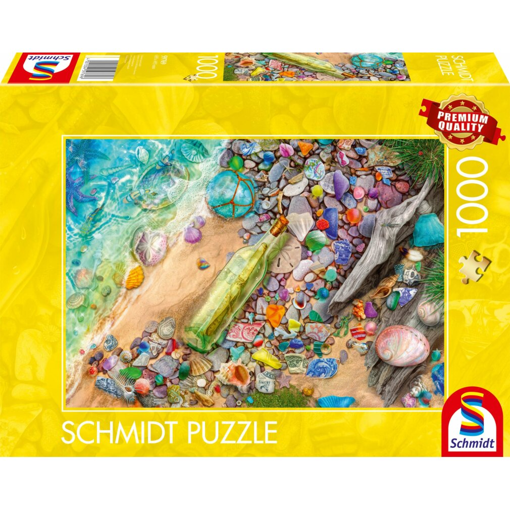 Puzzledose zeigt eine Strandszene: Muscheln, Steine, eine Flaschenpost und das Meer. Auf der Schachtel steht 'Schmidt Puzzle'.