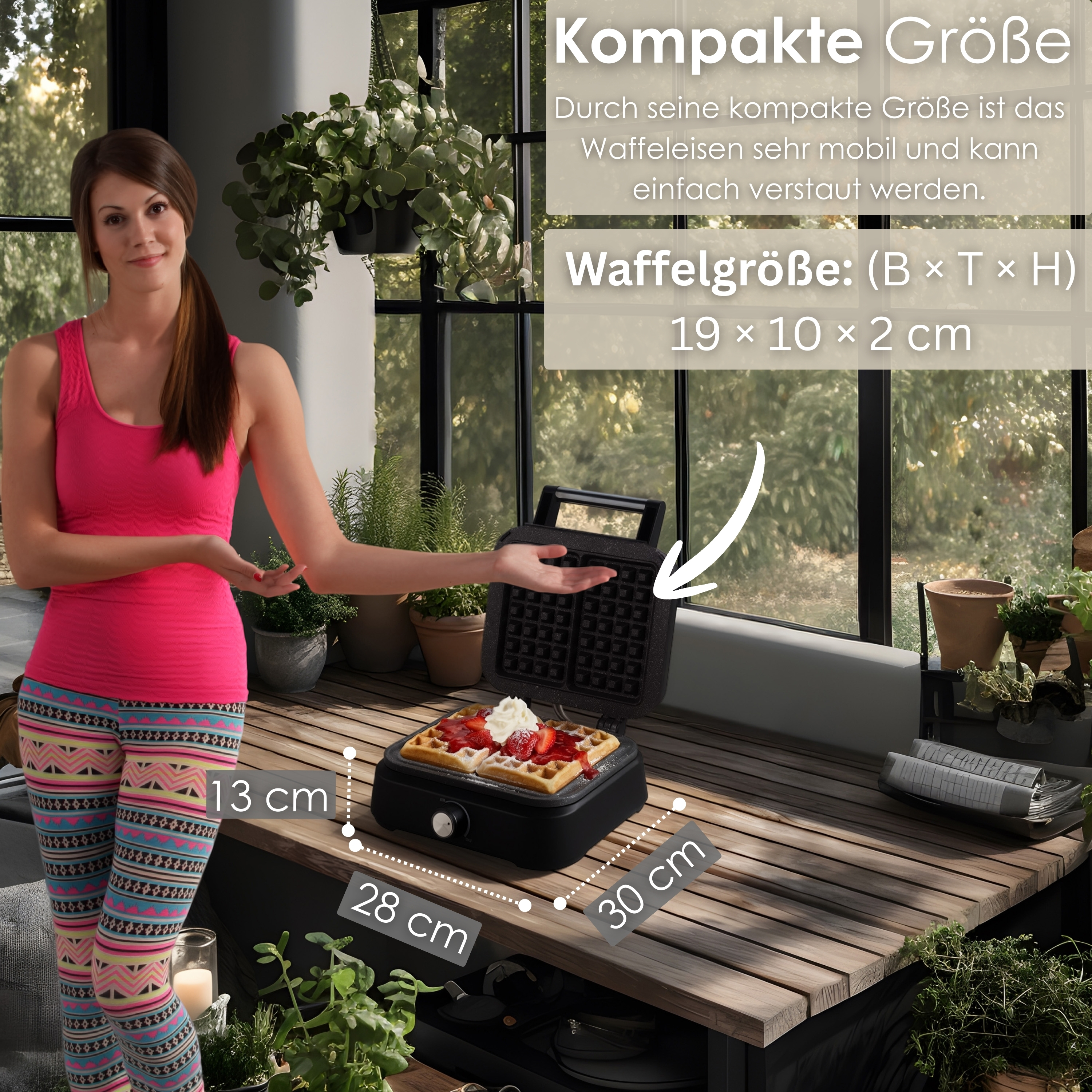 Kobieta w różowym topie, gofrownica z goframi. Wyświetlane są wymiary. Okno i rośliny w tle.