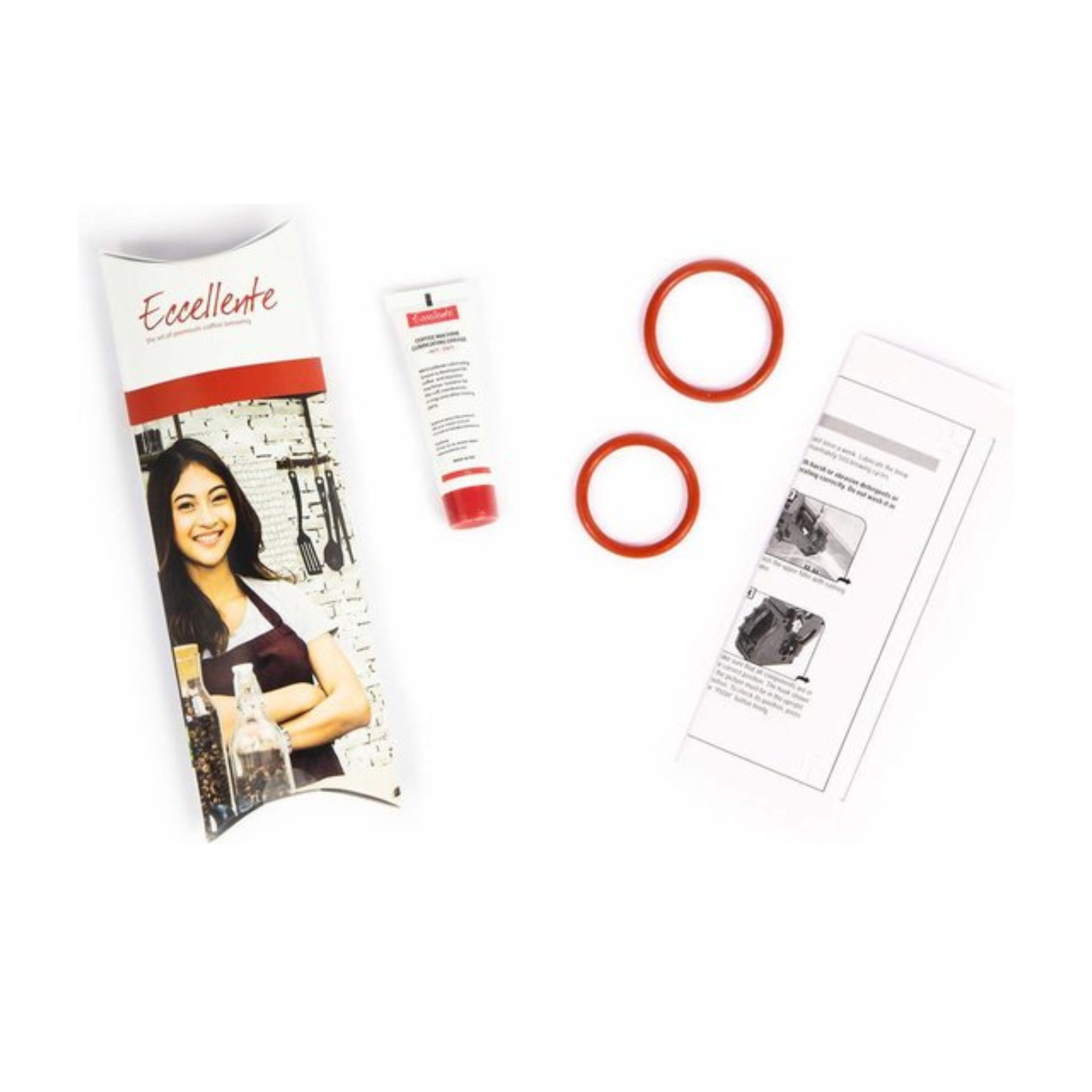 L'image montre une femme, des tubes, un manuel d'instructions et des anneaux sur une surface blanche.