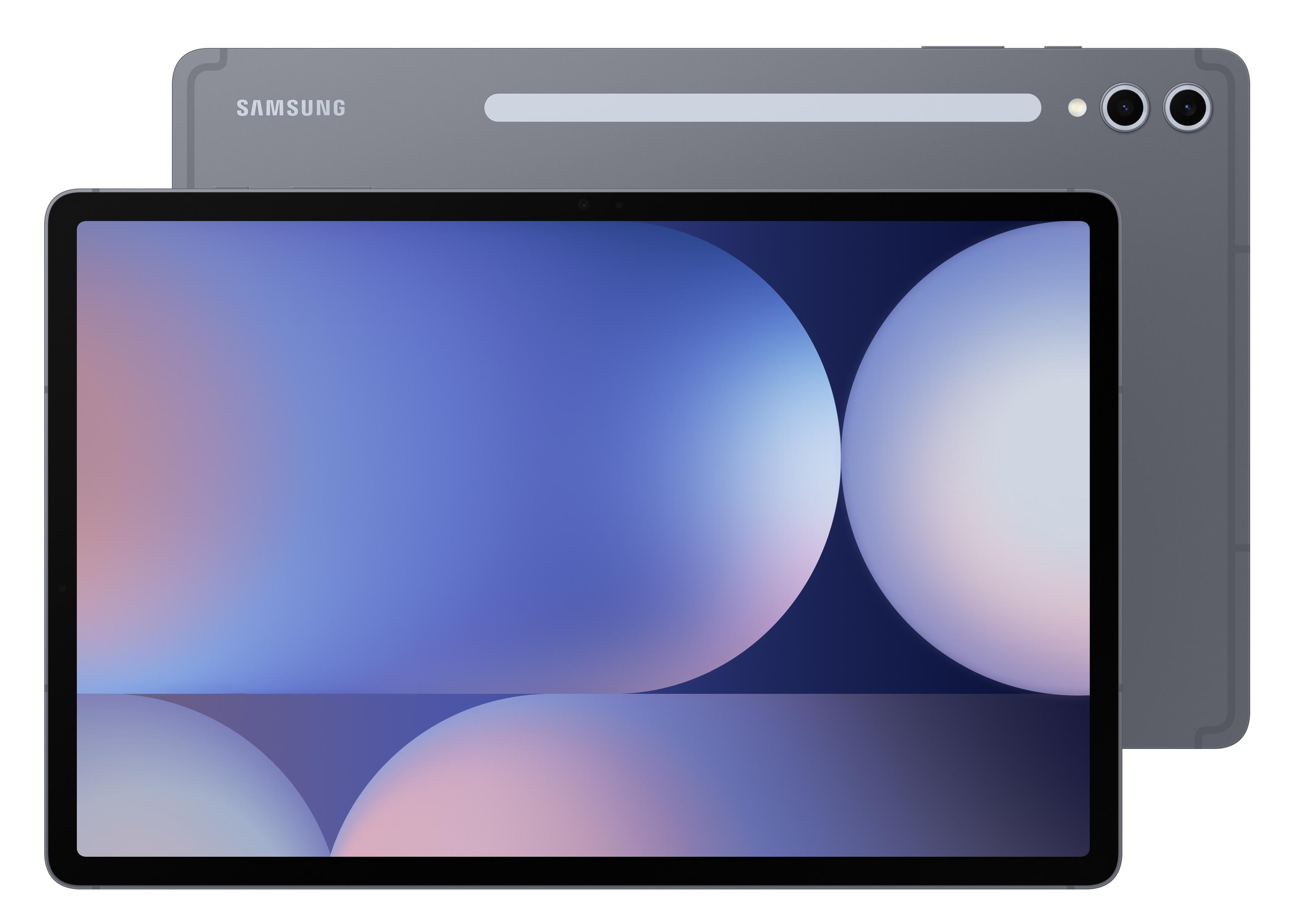 Szary tablet Samsung, pochylony, widok z przodu. Ekran pokazuje niebieskie i białe abstrakcyjne kształty.