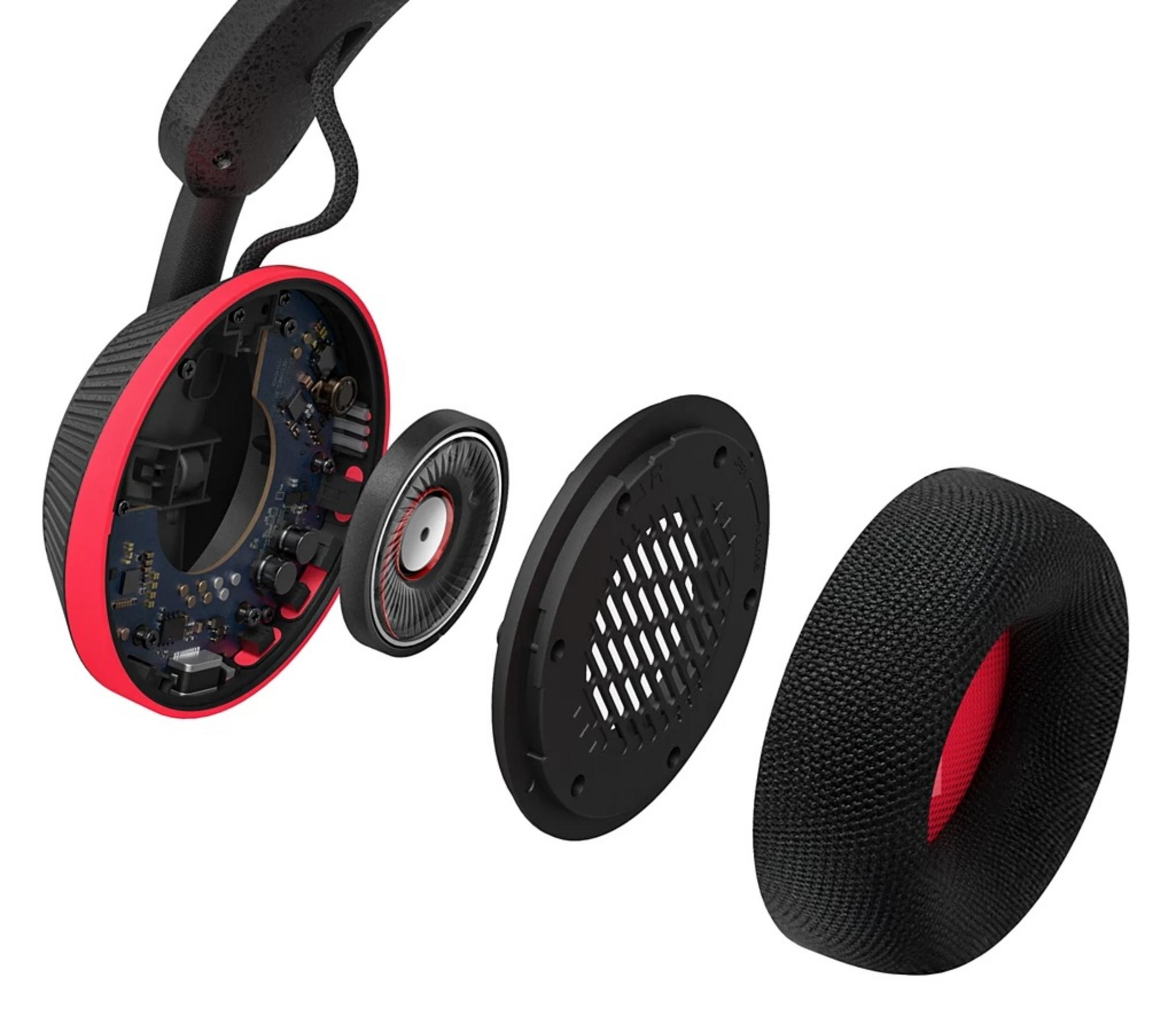 Vue éclatée d'un casque. Les pièces noires et rouges sont séparées : coussinet, haut-parleur, circuit interne et bandeau.