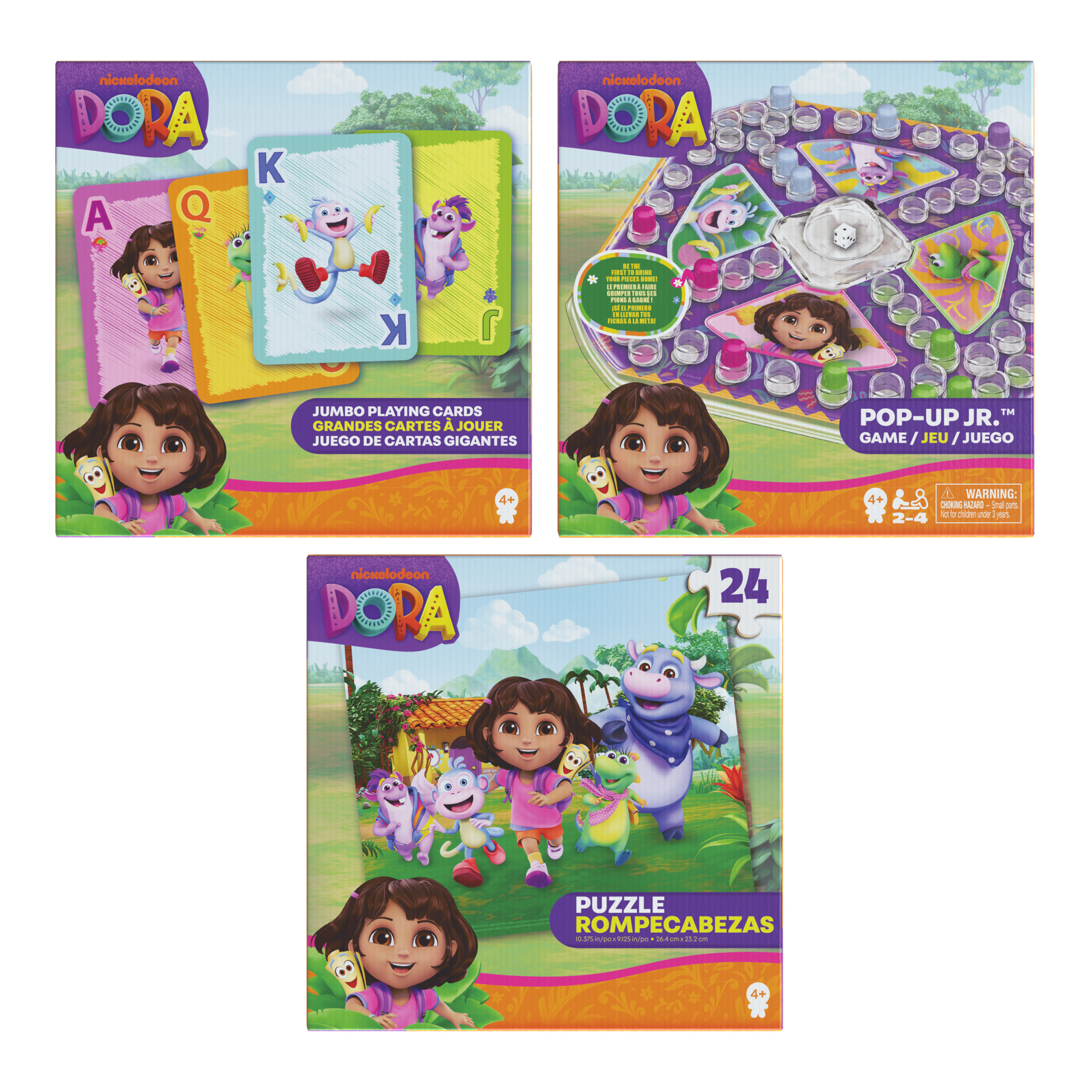 Tre scatole di Dora l'Esploratrice: carte da gioco, un gioco da tavolo e un puzzle.