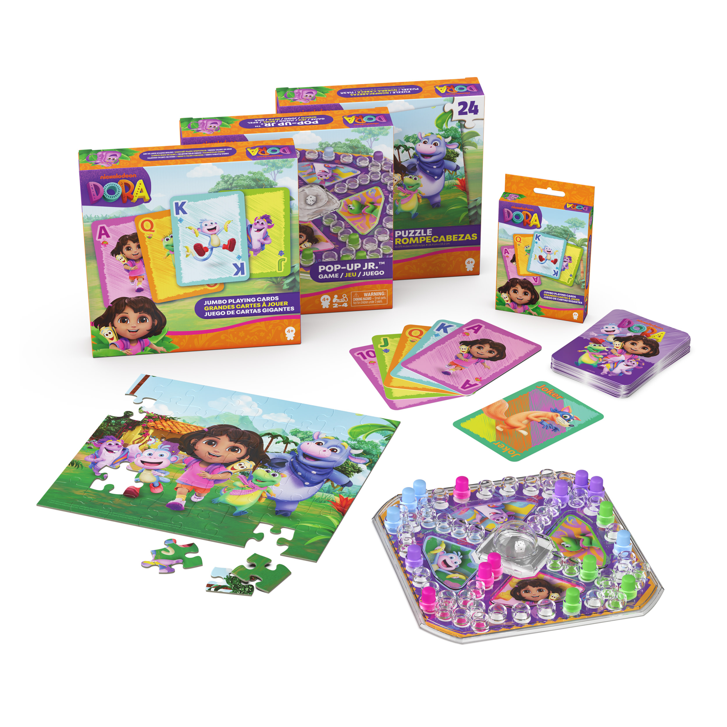 Un set di giochi di Dora l'Esploratrice con carte, un puzzle e un gioco da tavolo. I personaggi sono presenti su tutti gli articoli.