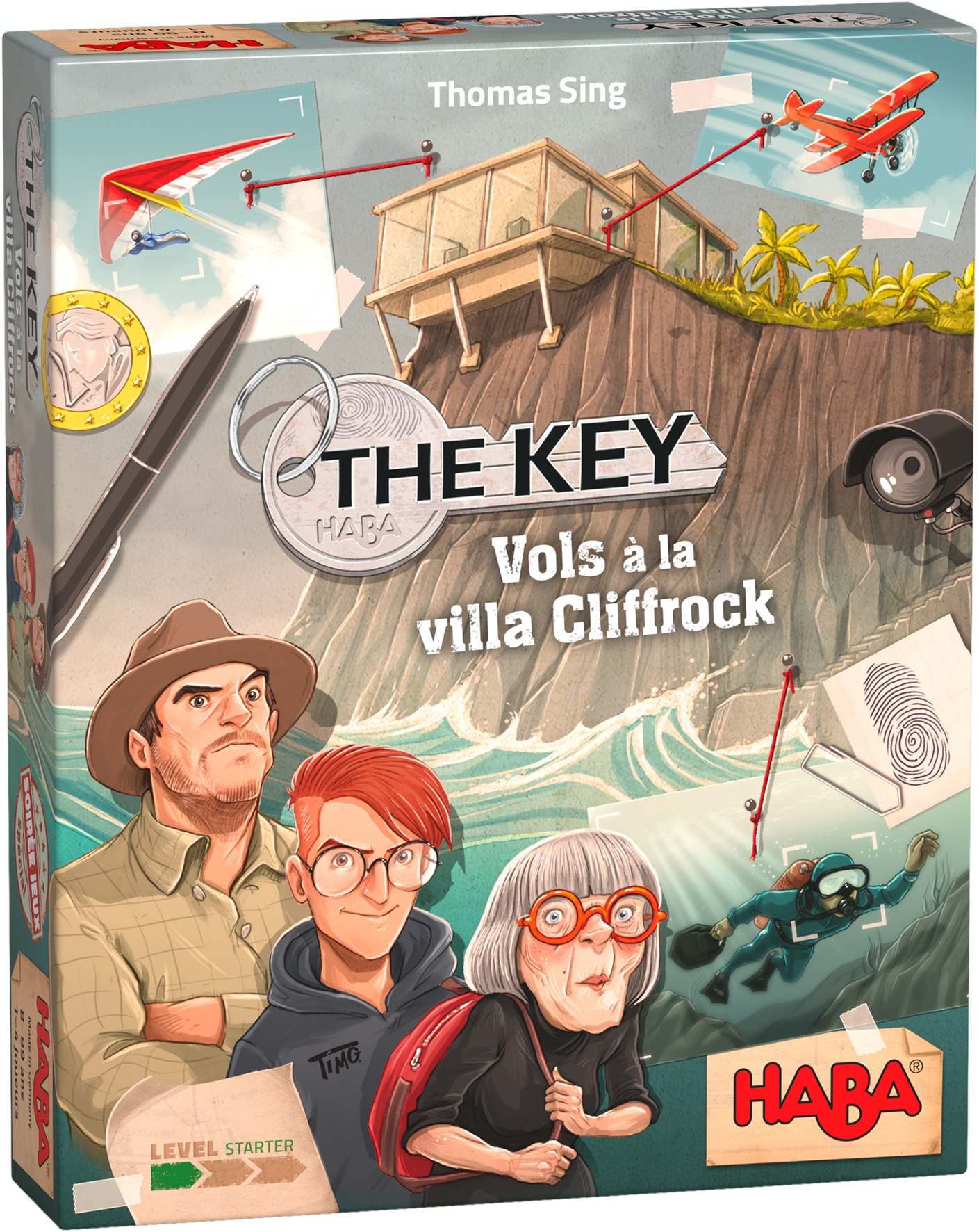 Spielbox-Art für 'The Key'. Zeigt Charaktere, eine Villa, ein Flugzeug und einen Taucher. Der Hintergrund zeigt Meereswellen.