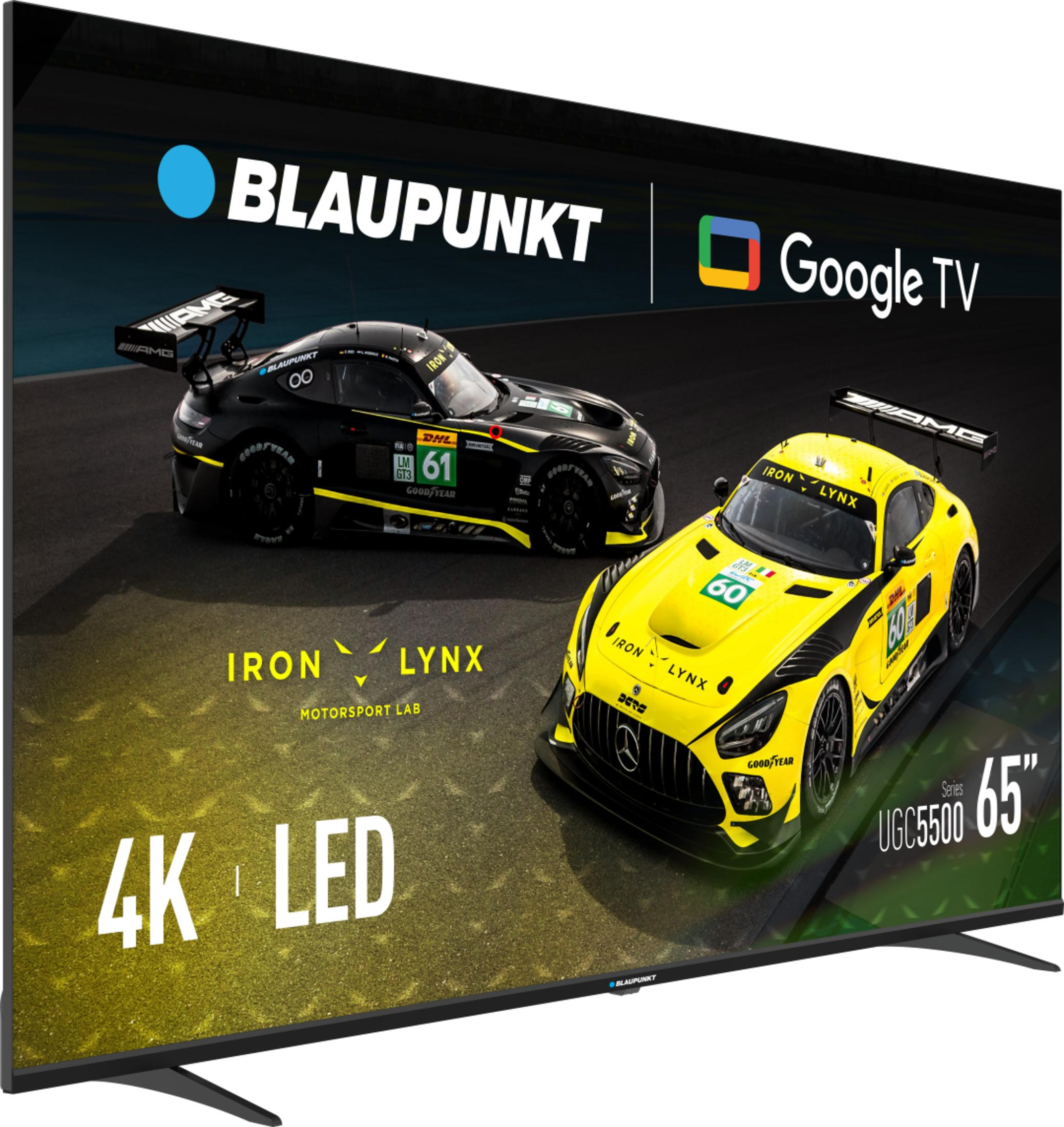 Ekran telewizora wyświetla dwa samochody wyścigowe, czarny i żółty. Widoczne są loga Blaupunkt, Google TV i Iron Lynx.