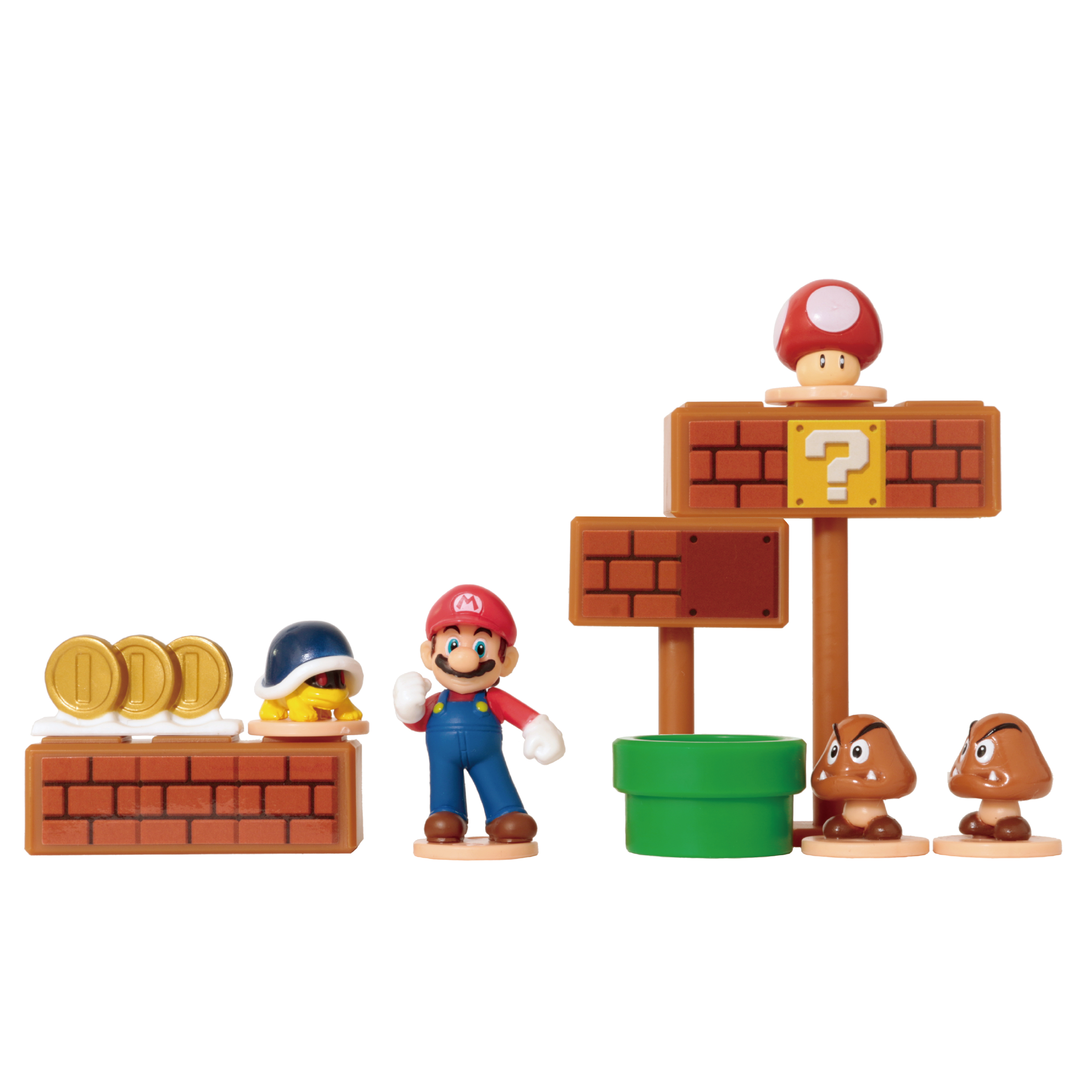 Mario-Figuren mit Münzen, einem Koopa Troopa, einem ? Block, einem Pilz, grüner Röhre und Gumbas vor weißem Hintergrund.