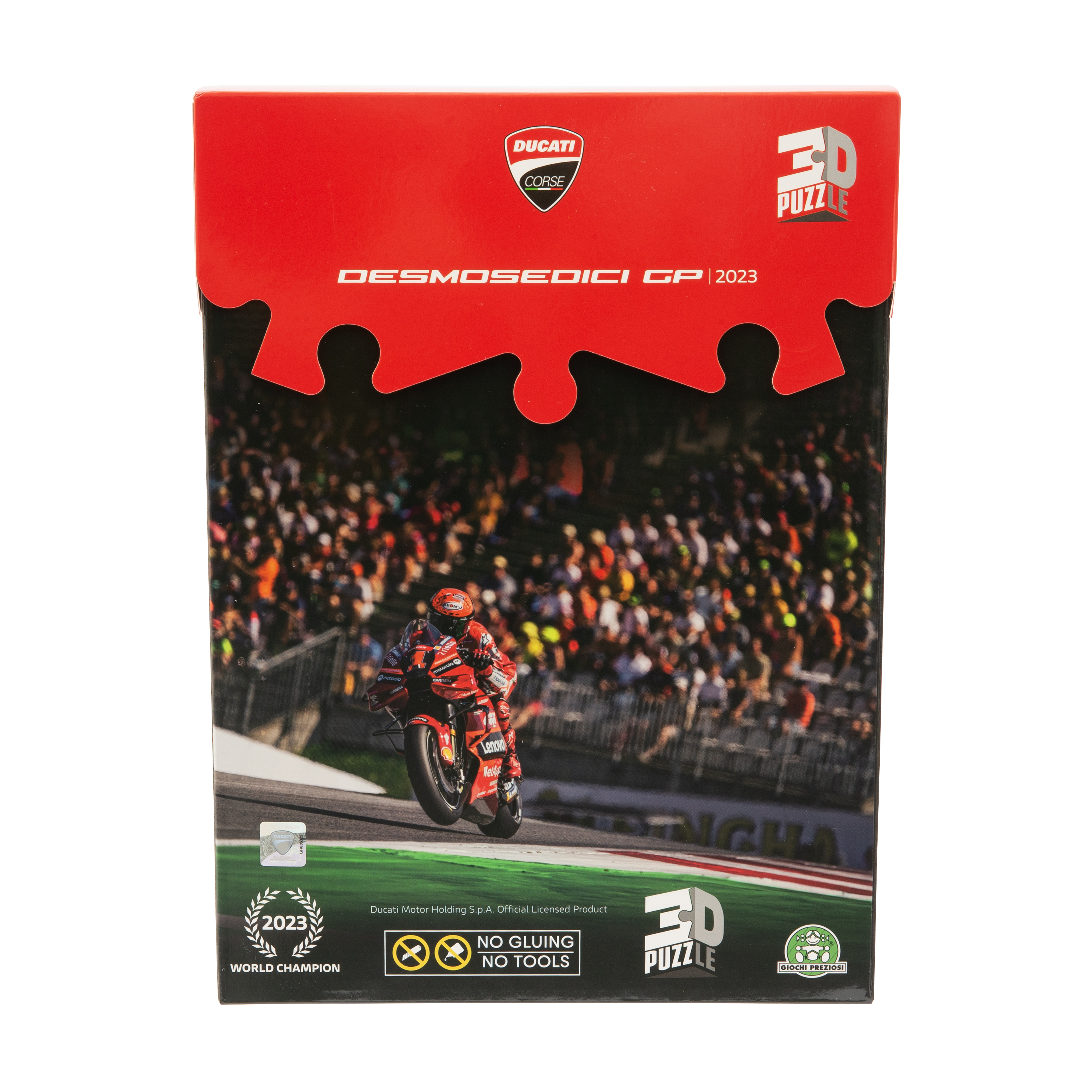 Pudełko z puzzlami Ducati Desmosedici GP 2023. Przedstawia wyścigi motocyklowe na torze z tłumem w tle.