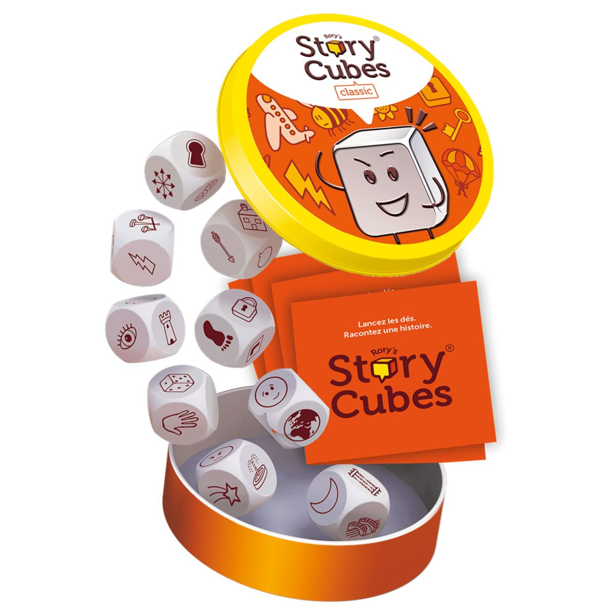 Eine gelbe Story Cubes-Box mit Würfeln mit Symbolen. Orangefarbene Karten und ein Deckel mit einem Cartoon-Gesicht sind ebenfalls sichtbar.