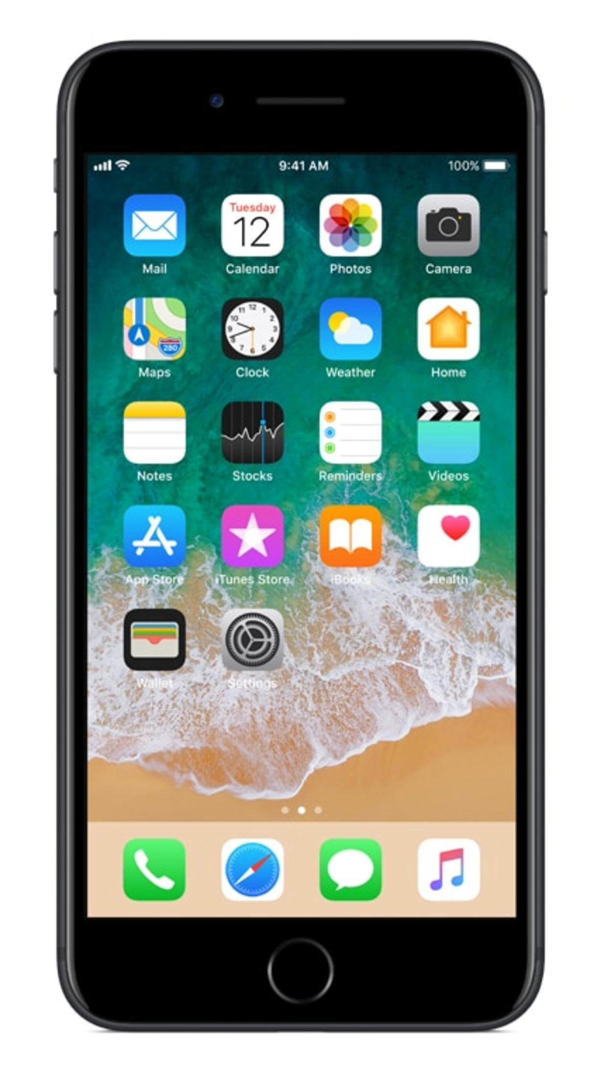 iPhone pokazuje ekran główny z ikonami aplikacji, takimi jak Poczta, Kalendarz, Zdjęcia i Aparat. Tło to scena plażowa.