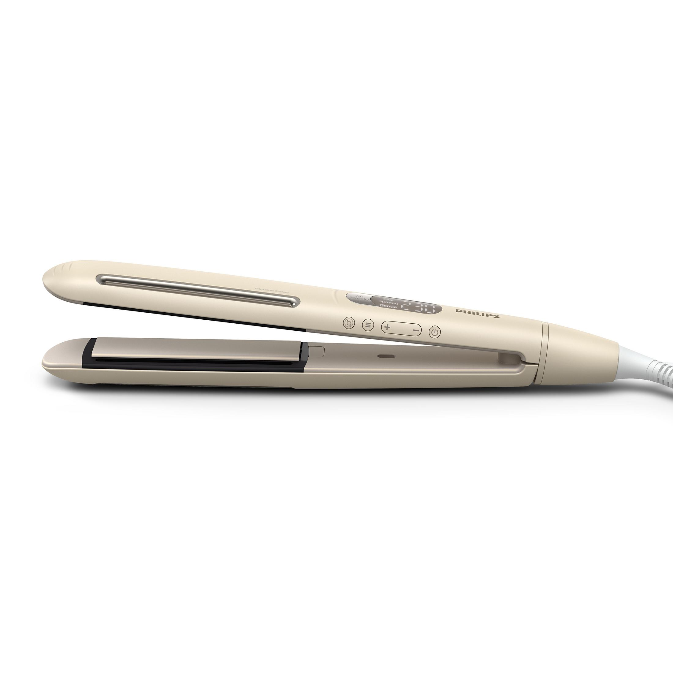 Piastra per capelli Philips beige. Aperta, con display digitale e pulsanti. Sfondo bianco.