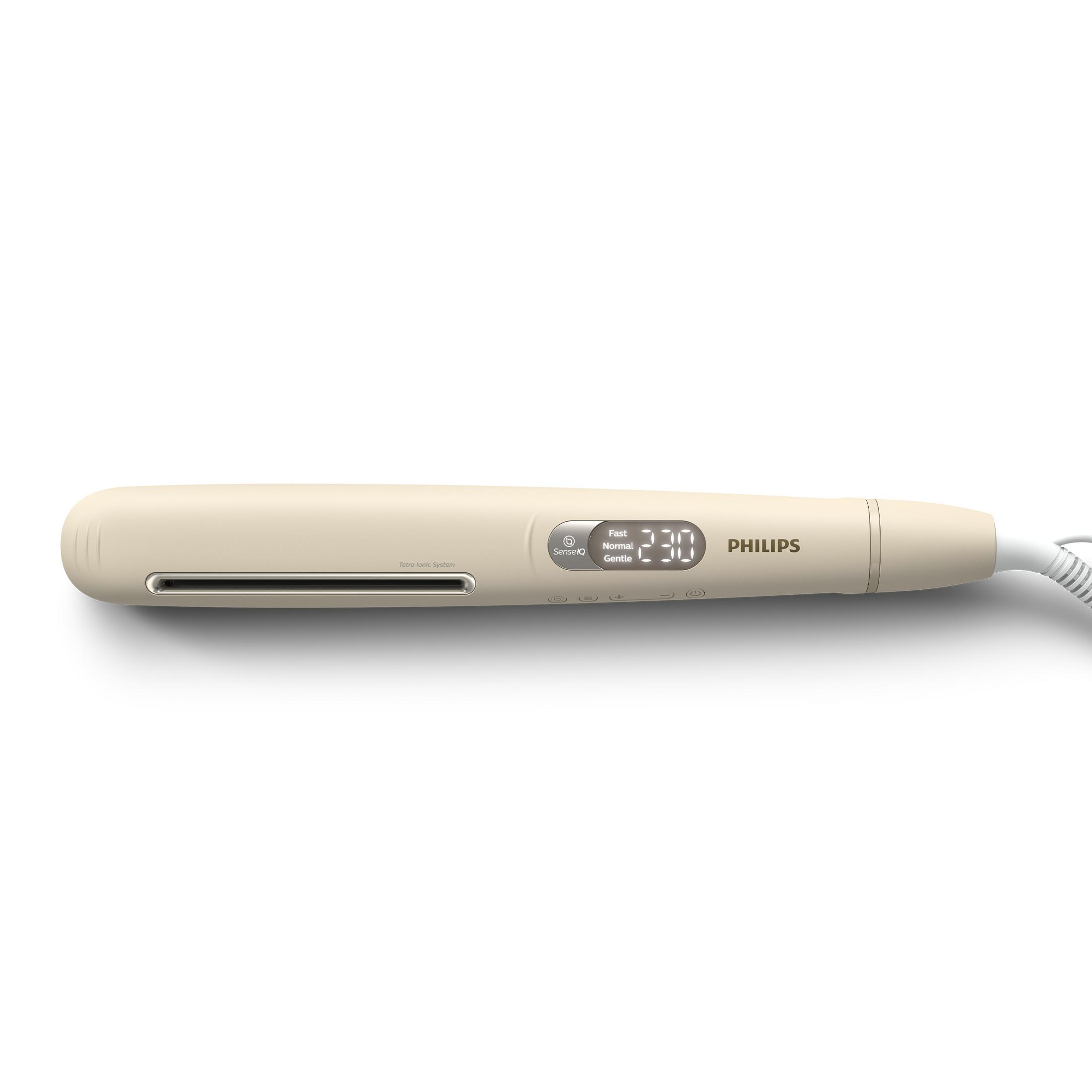 Una piastra per capelli Philips beige su una superficie bianca. Ha un display digitale che mostra 230 e pulsanti.