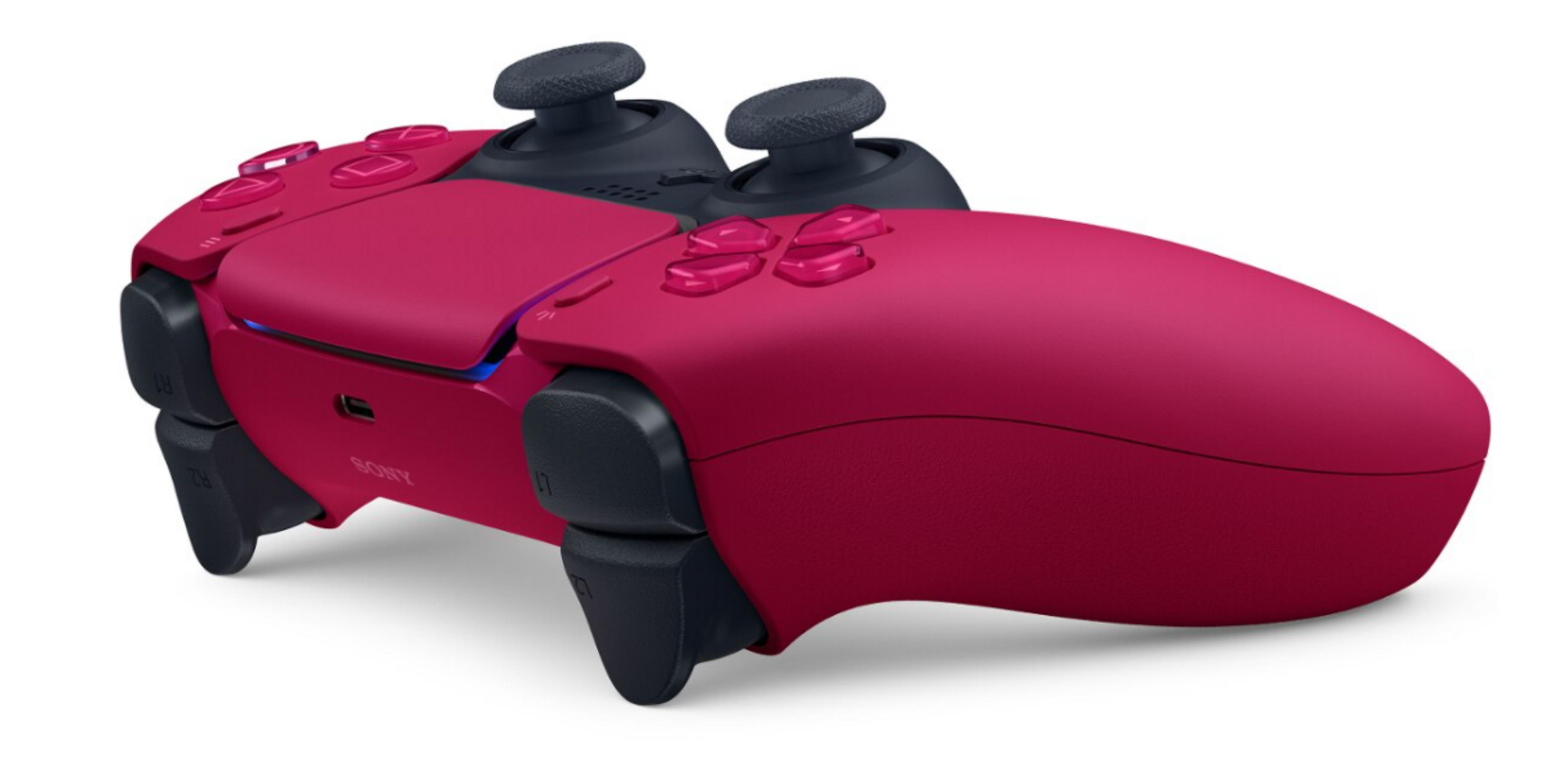 Un mando magenta de PlayStation 5 sobre un fondo blanco. Tiene palancas, botones y gatillos grises oscuros.