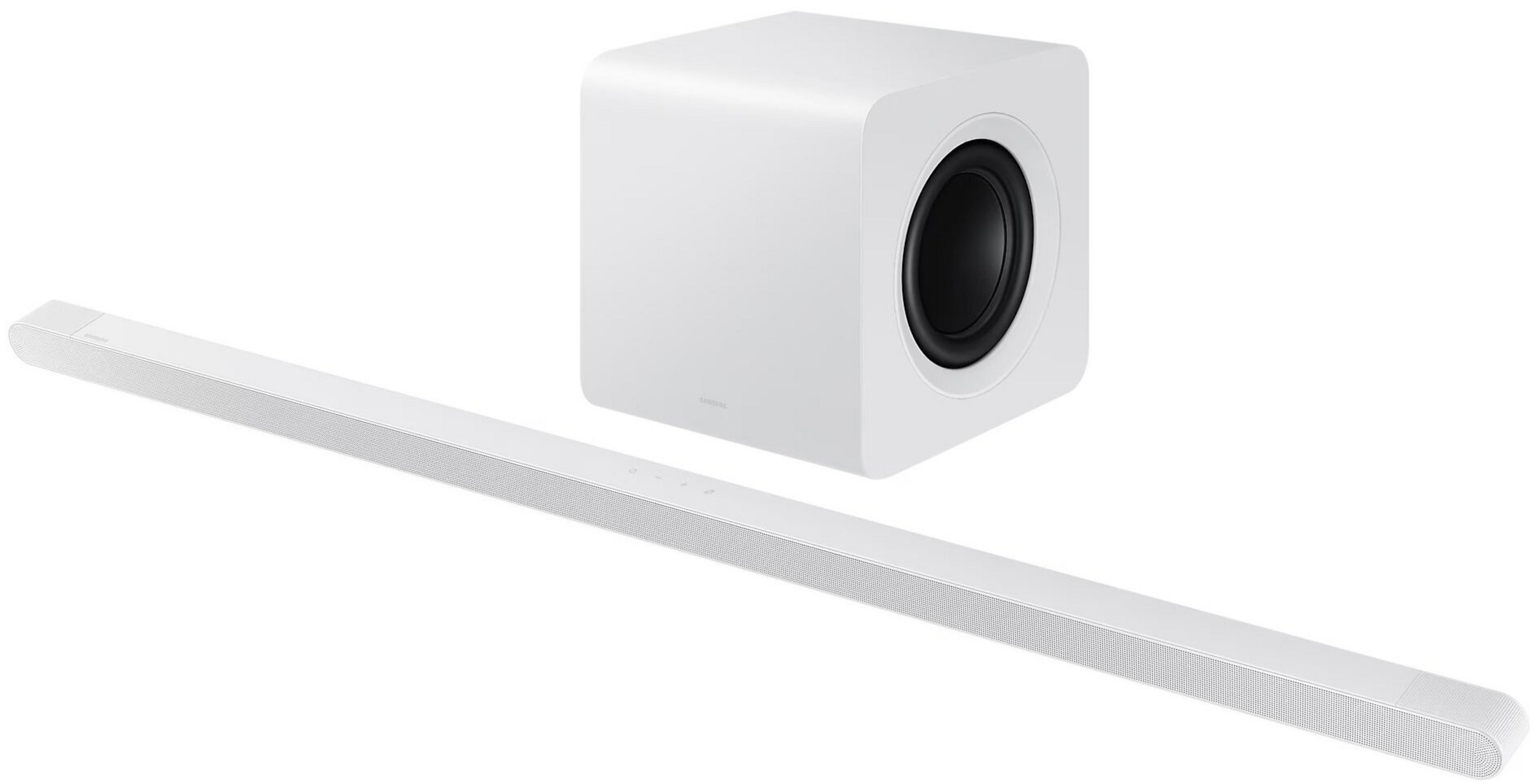 Biały soundbar i subwoofer. Subwoofer to biała kostka z czarnym głośnikiem. Soundbar jest długi i biały.