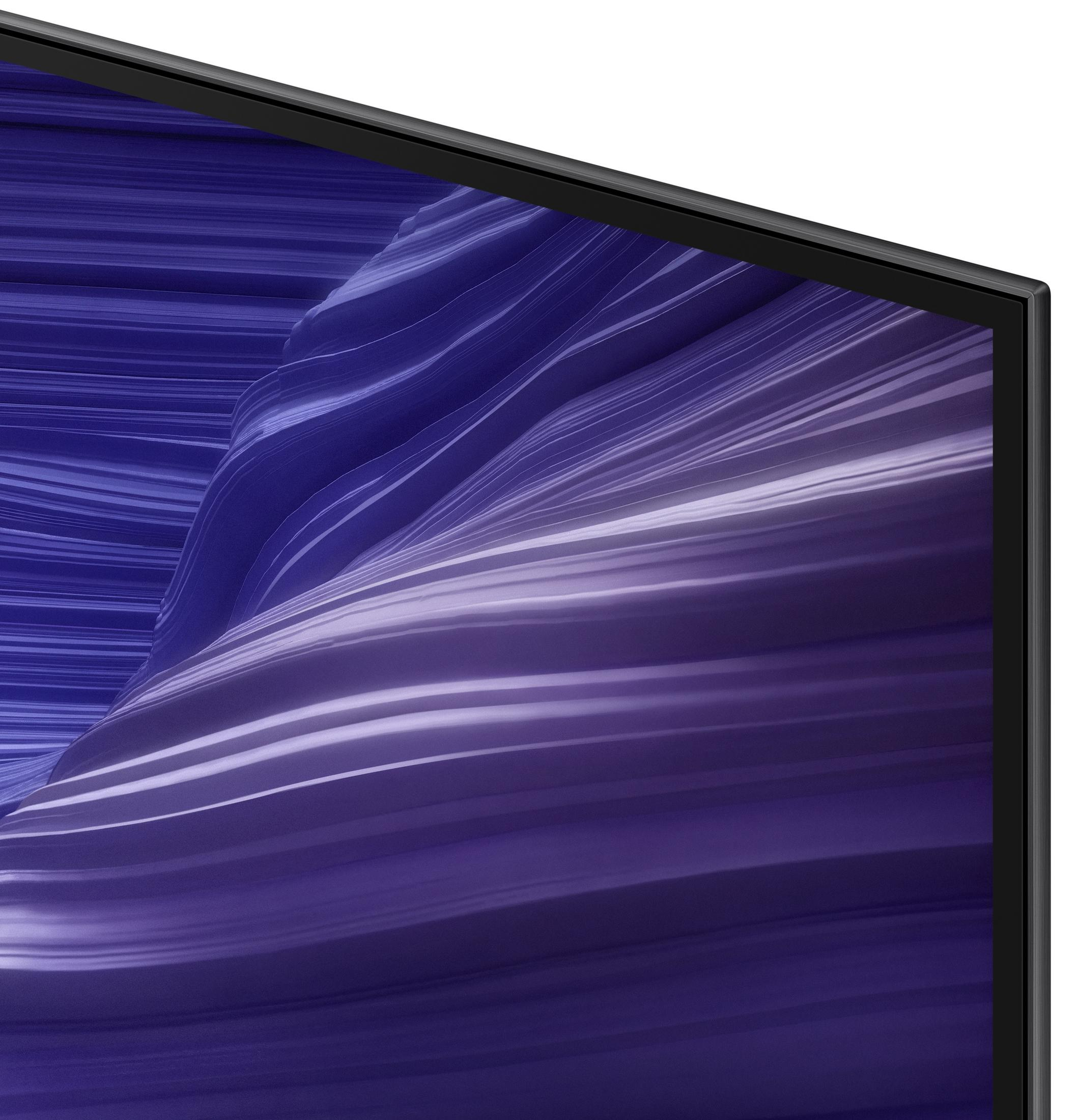 Close-up of a TV screen with a swirling purple and white abstract design. Black frame visible.