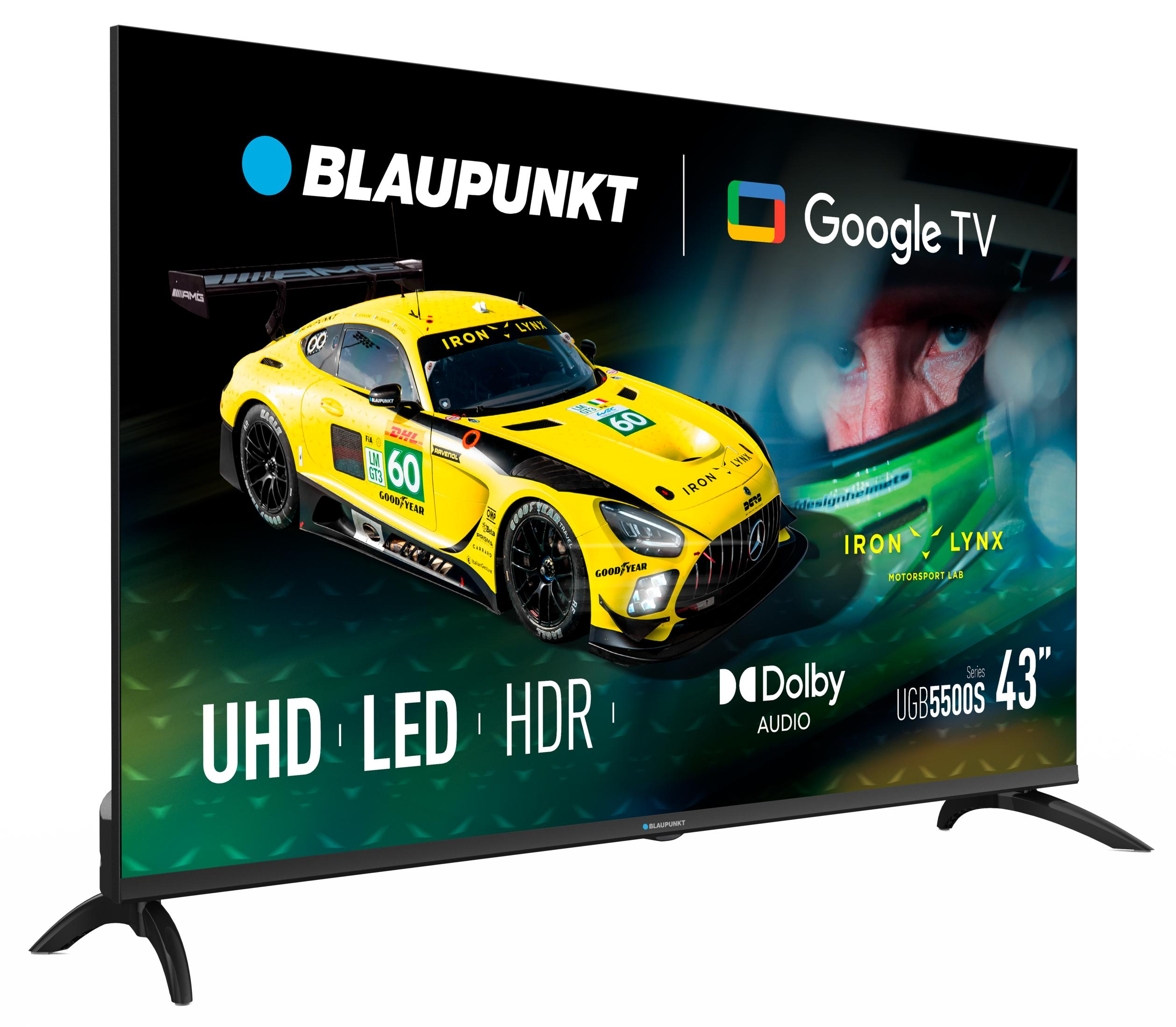 Telewizor Blaupunkt wyświetla żółty samochód wyścigowy z logo i tekstem, w tym 'Google TV' i '43"'.