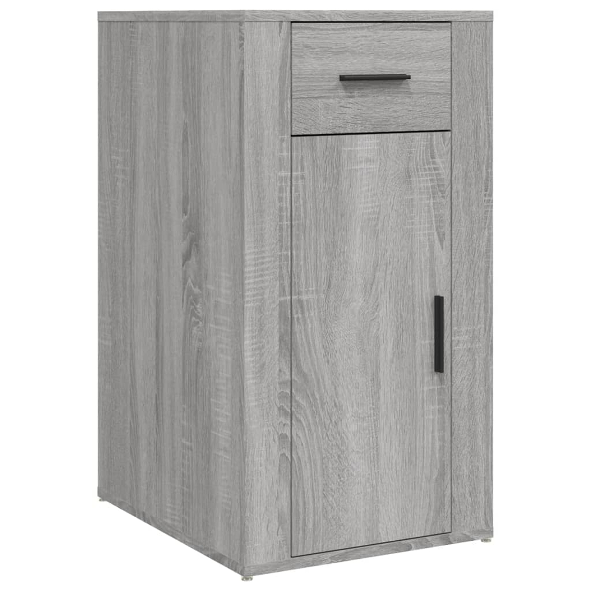 Ein grauer Holzschrank mit einer Schublade und einer Tür. Die Schublade hat einen schwarzen Griff. Die Tür hat ebenfalls einen schwarzen Griff.